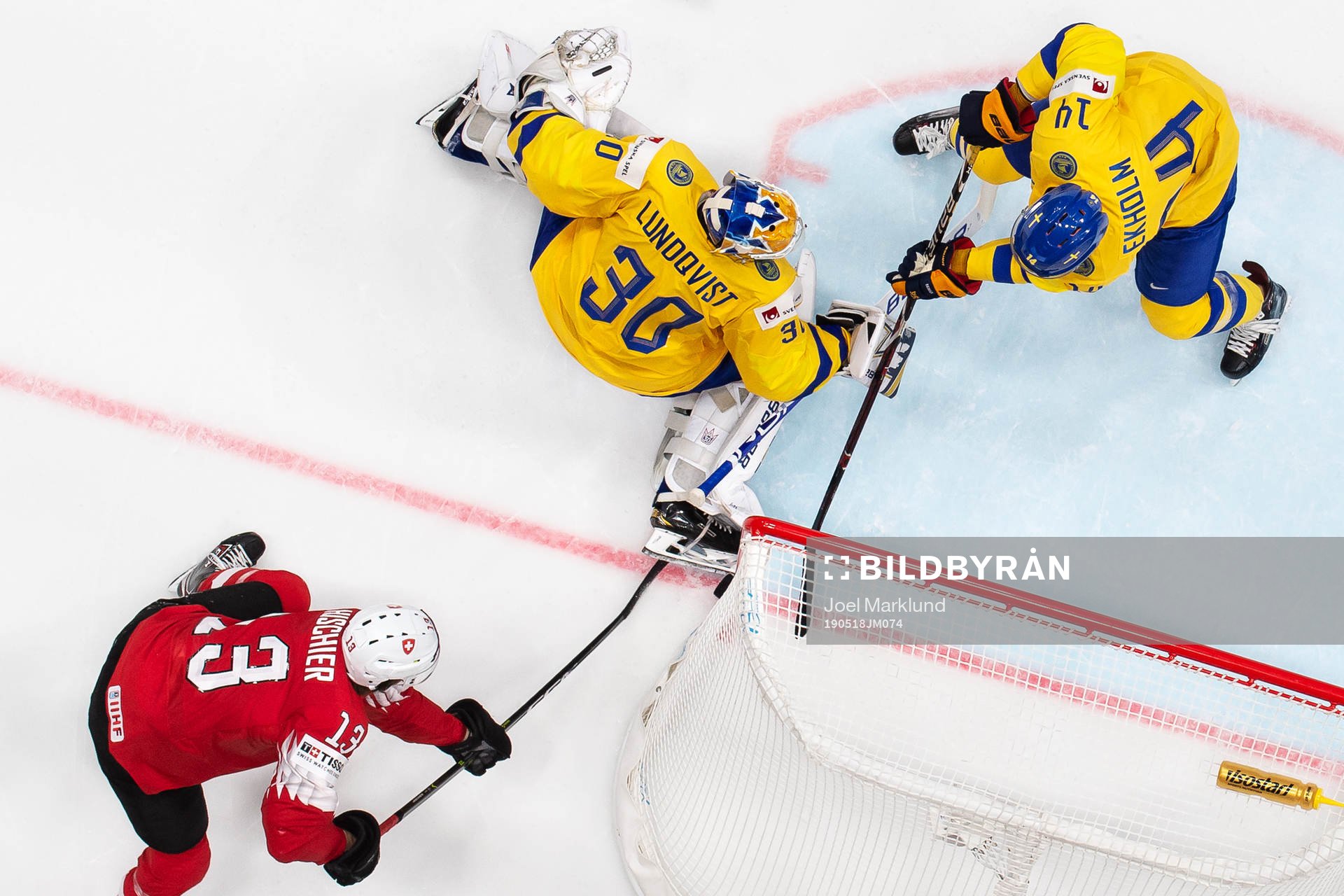 Nico Hischier of Switzerland tries to score behind