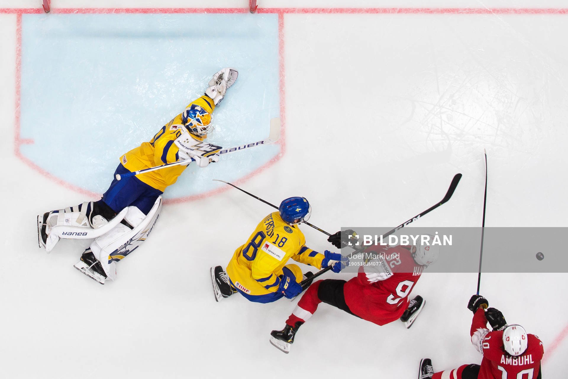 Goaltender Henrik Lundqvist and Marcus Pettersson of Sweden