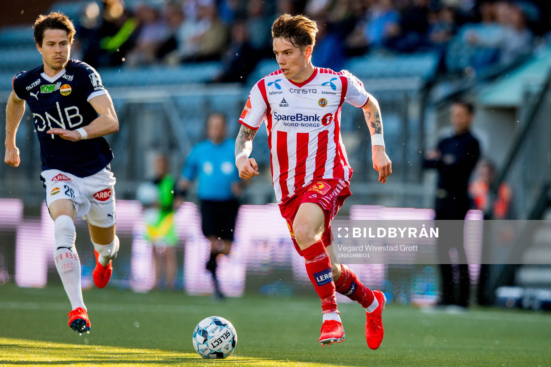 Lars Vilsvik of Strømsgodset and Robert Taylor of Tromsø