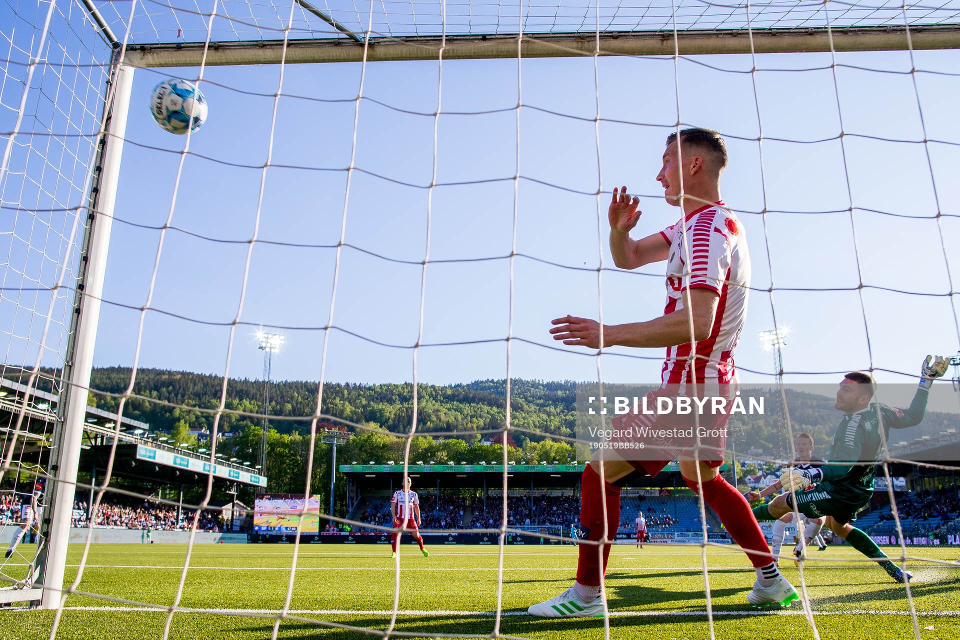 Martin Rønning Ovenstad of Strømsgodset scores 2-1 behind