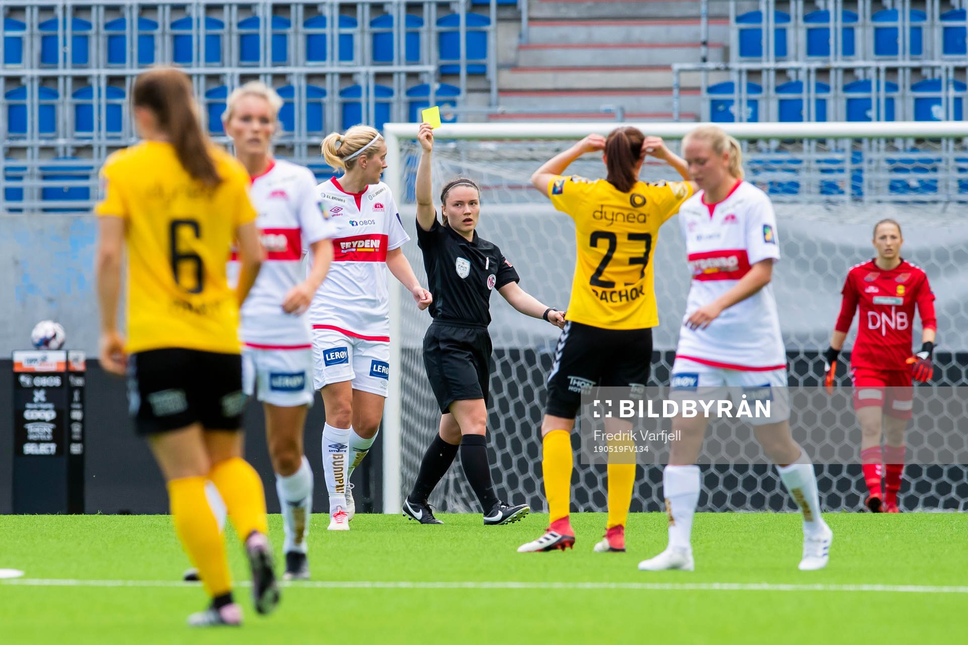 Maria Brochmann of Sandviken is shown a yellow card by