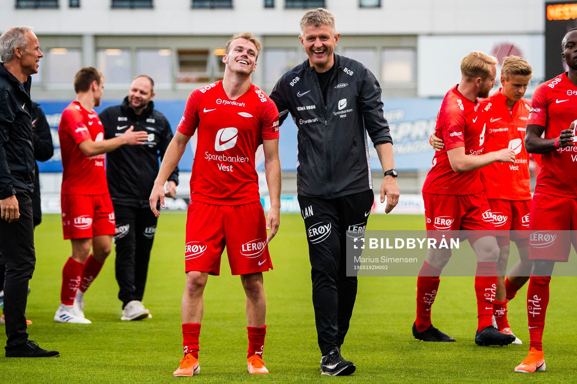 Petter Strand of Brann and Lars Arne Nilsen, head coach of Brann, celebrates after the Eliteserien match between Bodø/Glimt and Brann on May 19, 2019 in Bodø.