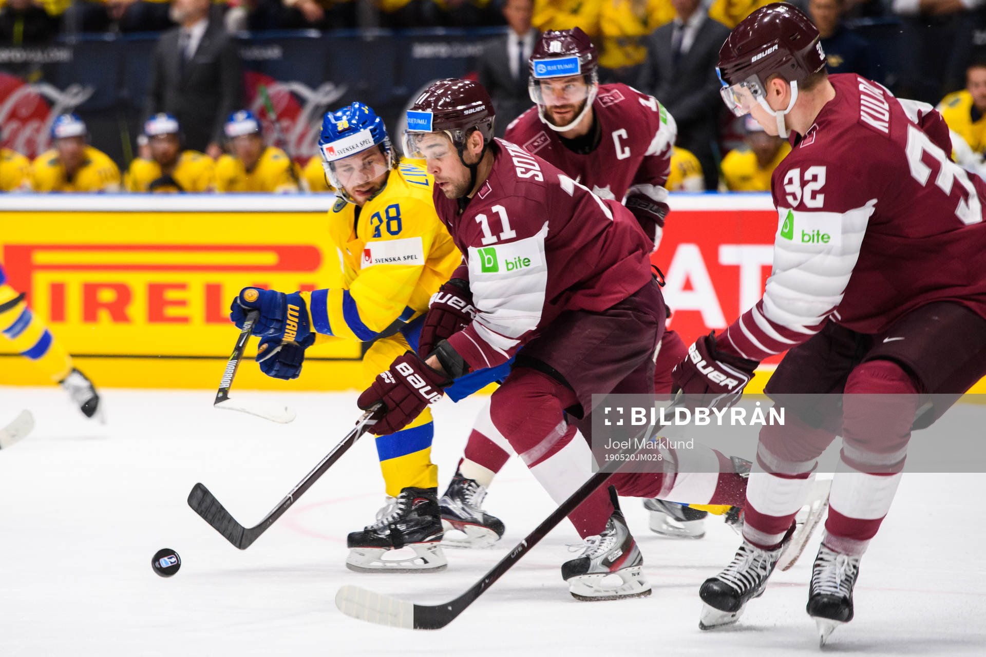 Elias Lindholm of Sweden against Kristaps Sotnieks and