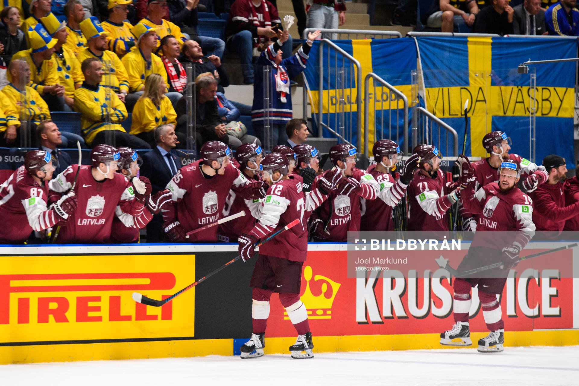 Janis Jaks and Rihards Bukarts celebrates with the bench