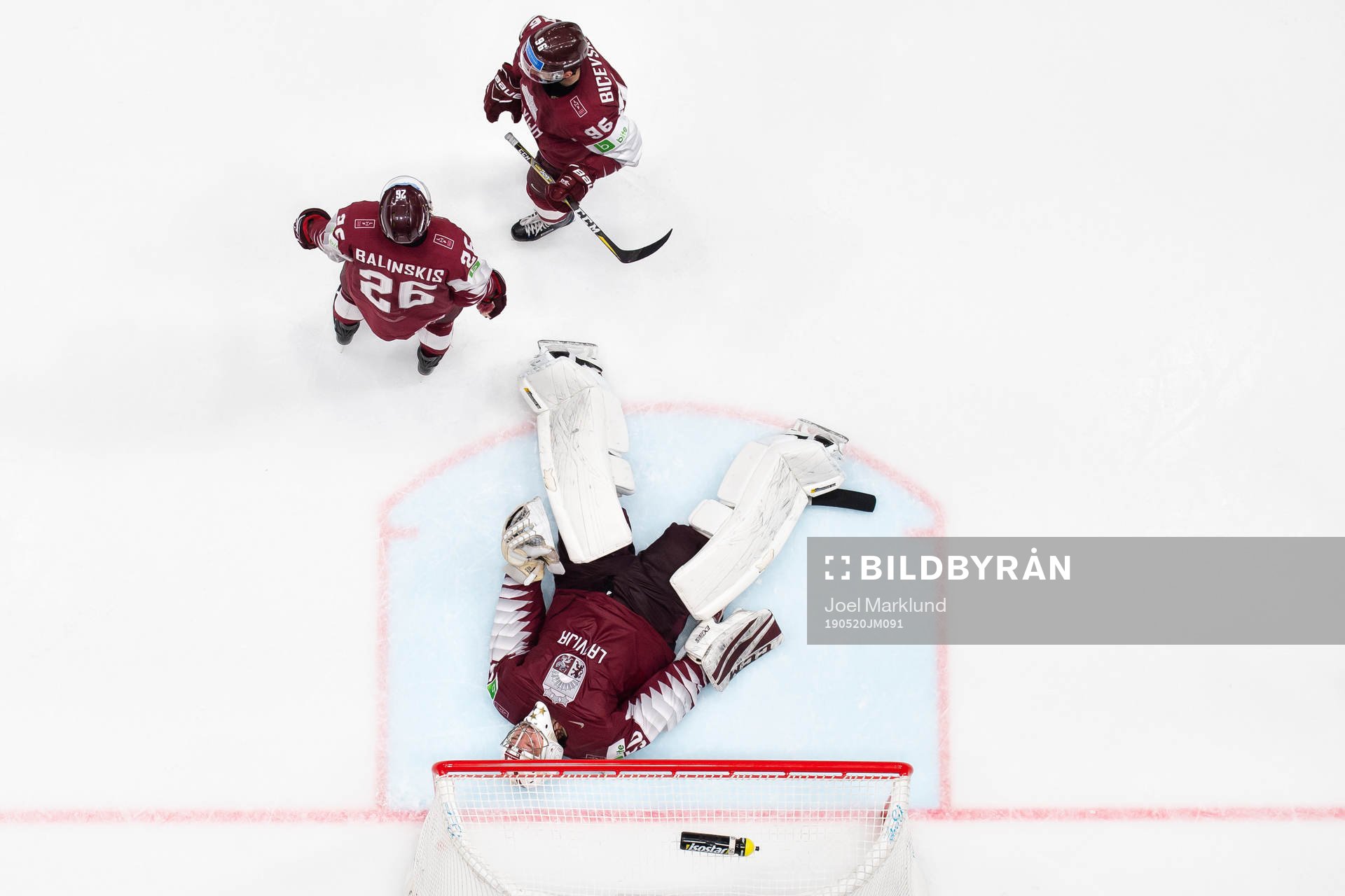 Uvis Balinskis, goaltender Kristers Gudlevskis and Maris