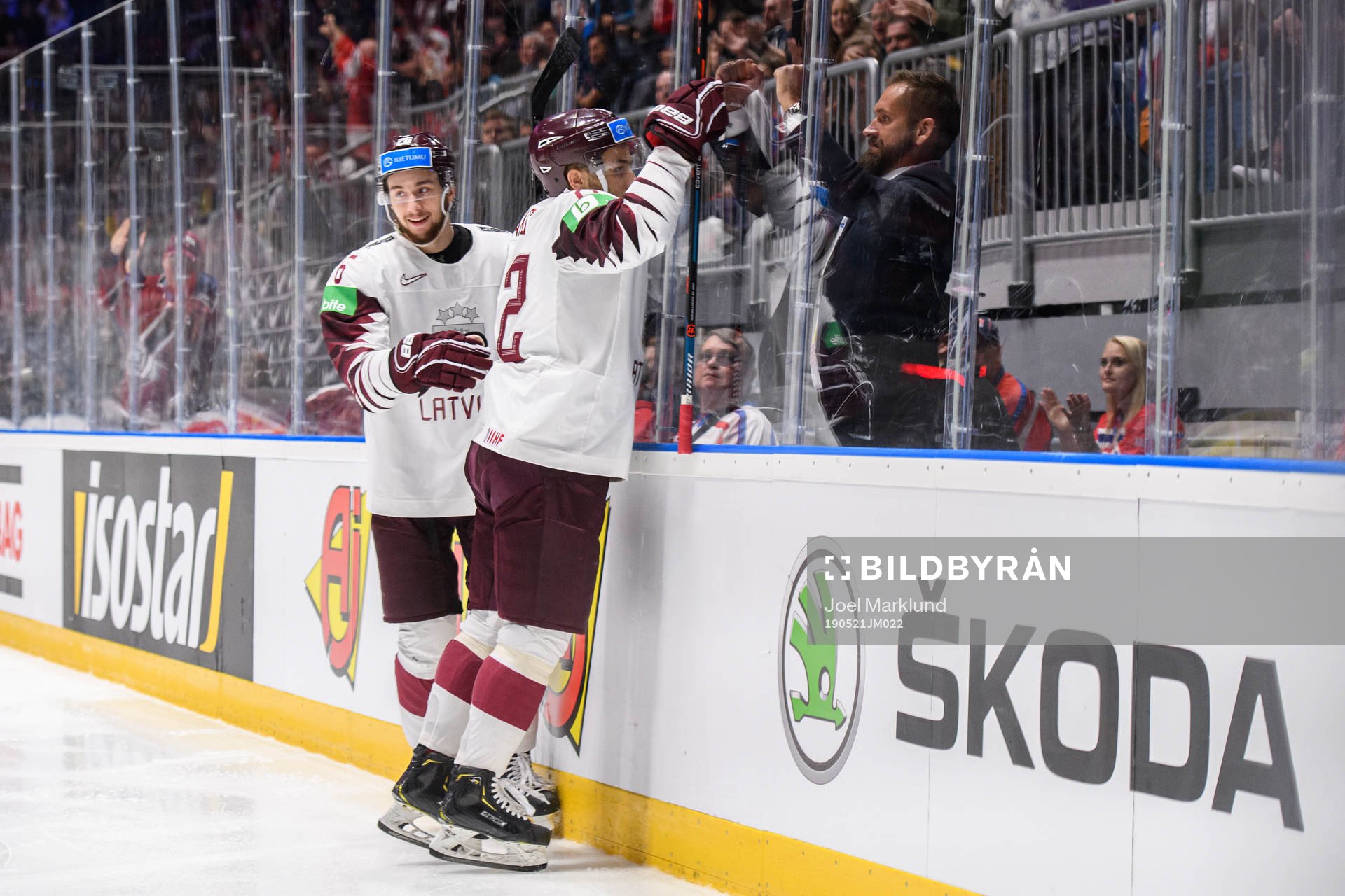 Janis Jaks and Uvis Balinskis of Latvia celebrate