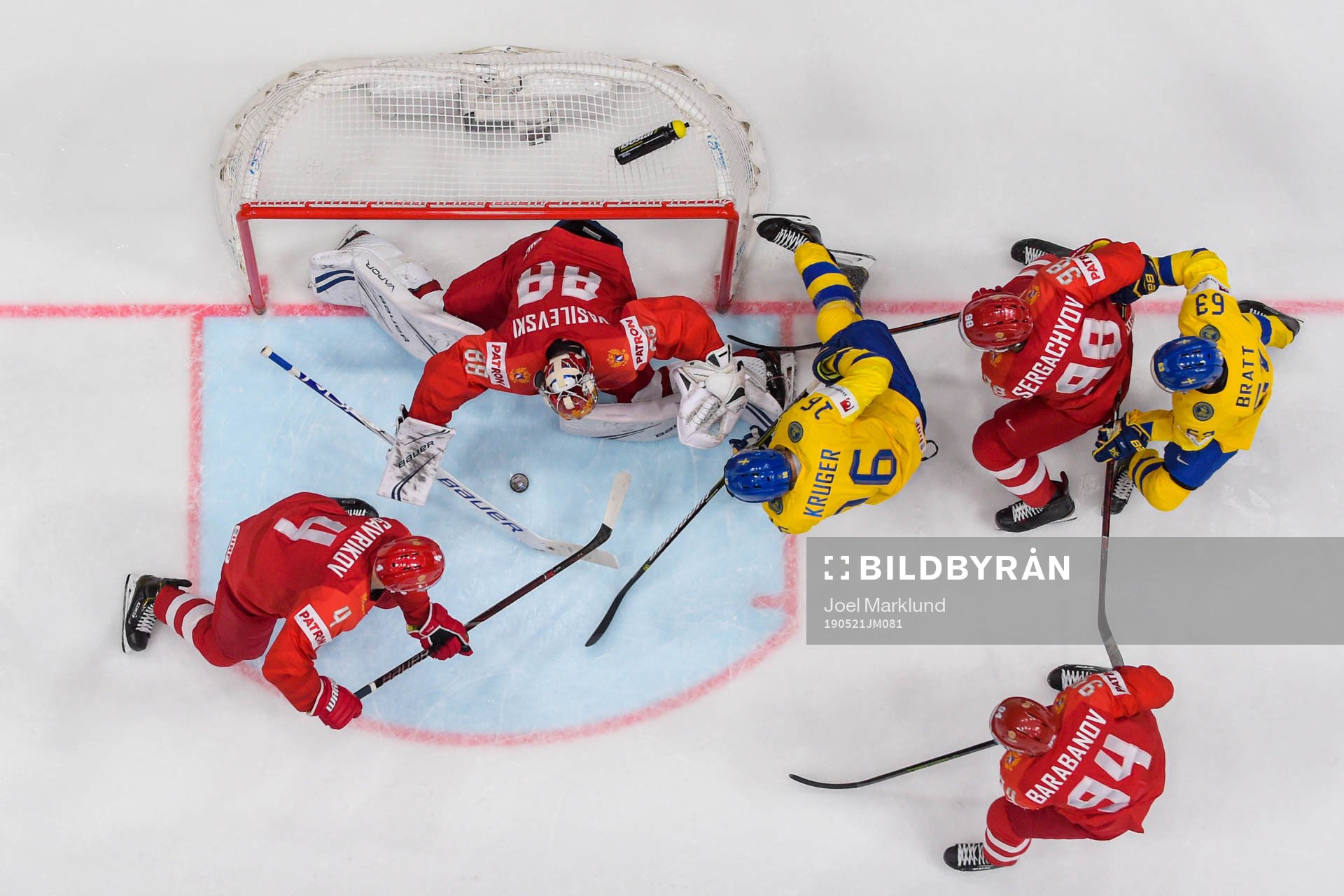Marcus Krüger and Jesper Bratt of Sweden against Mikhail