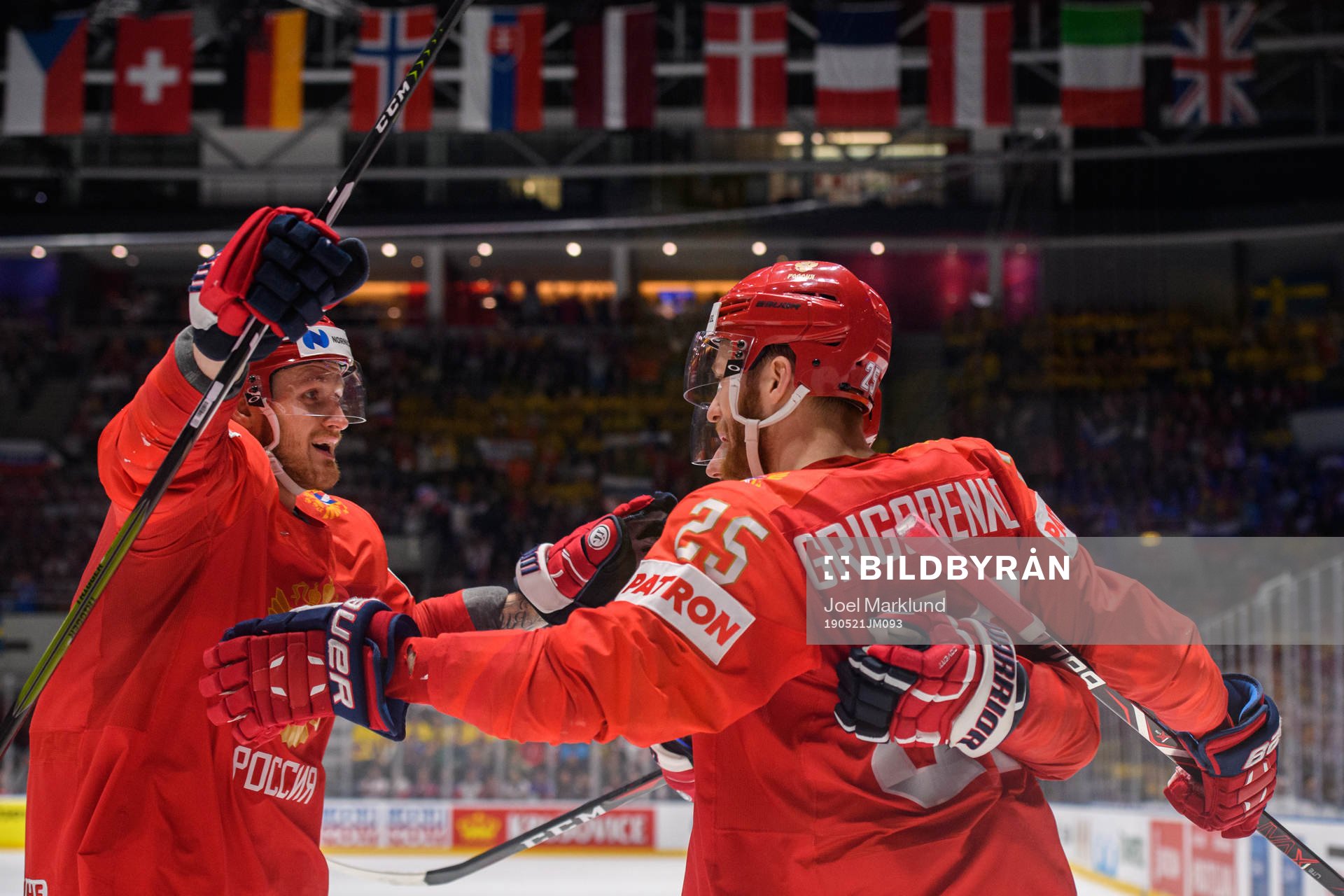 Ivan Telegin and Mikhail Grigorenko of Russia celebrate the