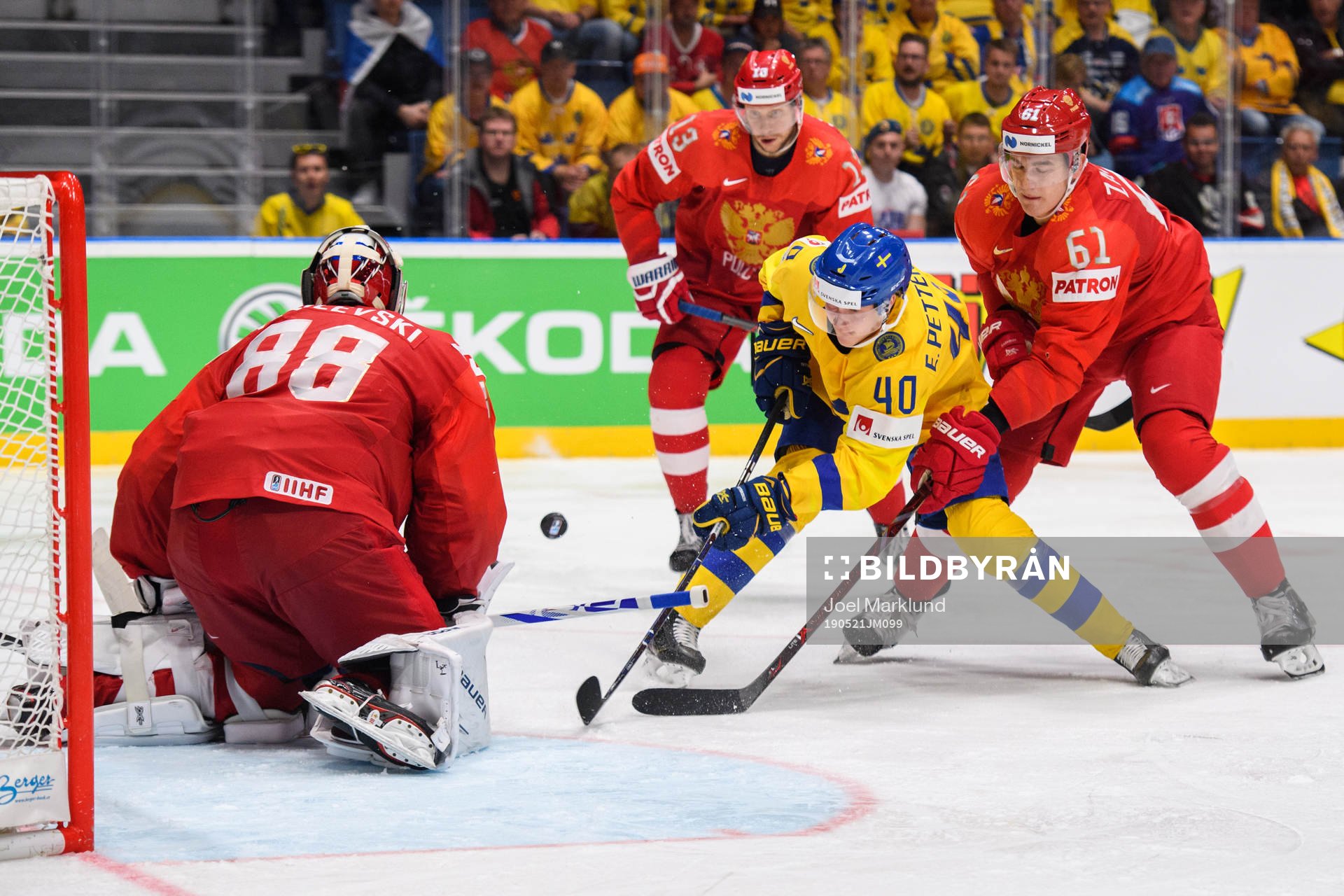 Elias Pettersson of Sweden against goaltender Andrei
