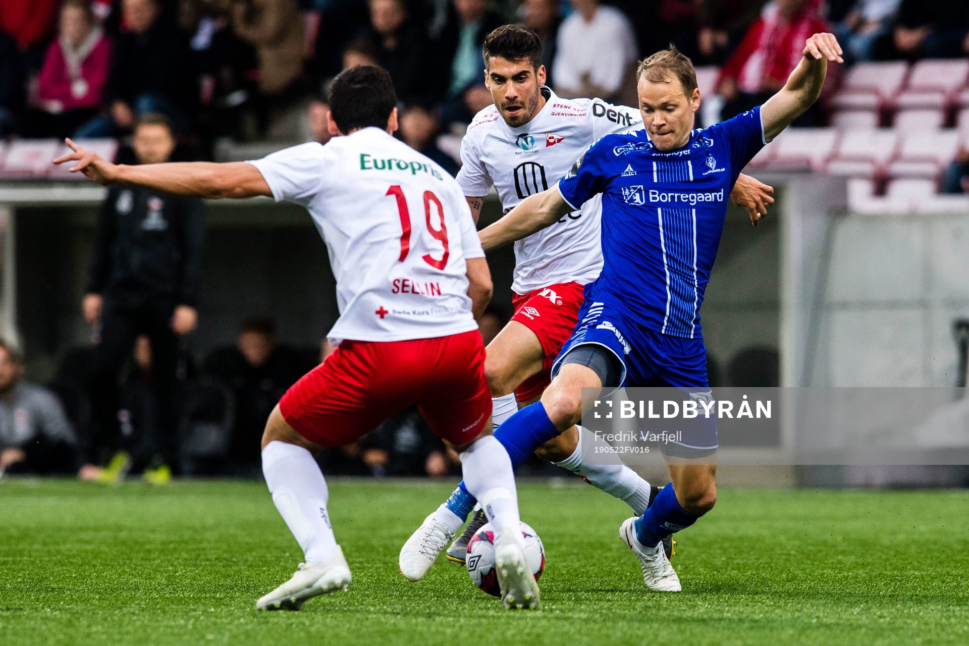 Kjell Rune Sellin and Maikel of FFK against Matti Lund