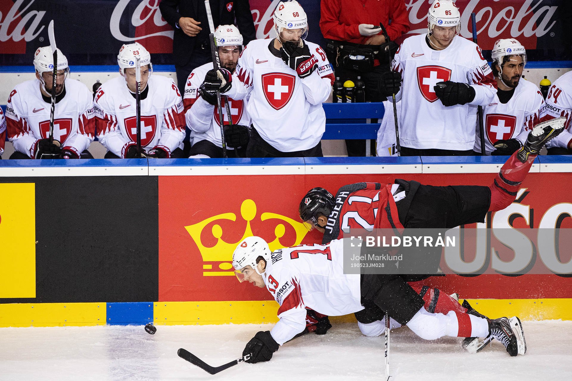Nico Hischier of Switzerland and Mathieu Joseph of Canada