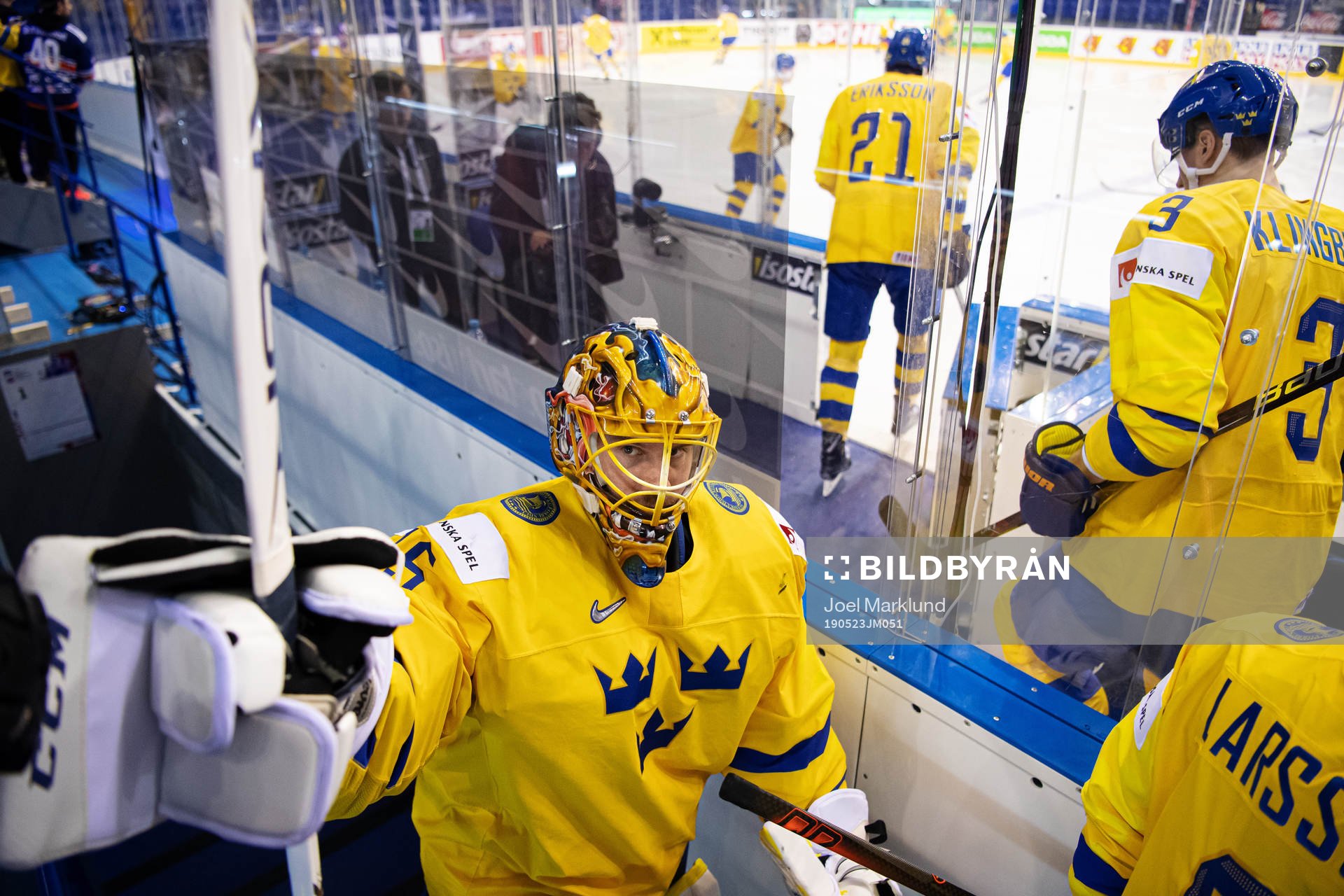 Goaltender Jacob Markström of Sweden fist bumps with a fan