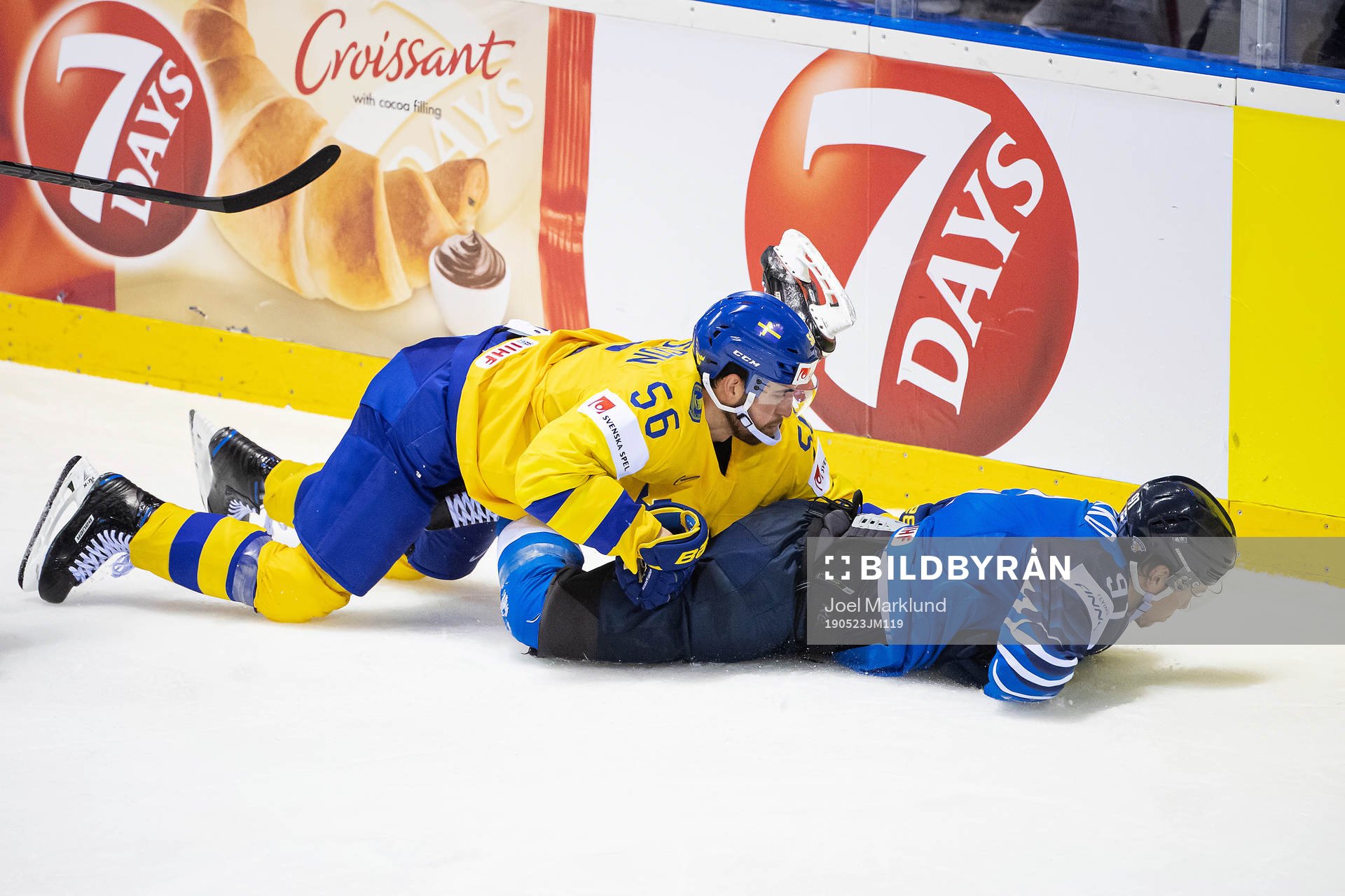 Juho Lammikko of Finland  is held down by Erik Gustafsson
