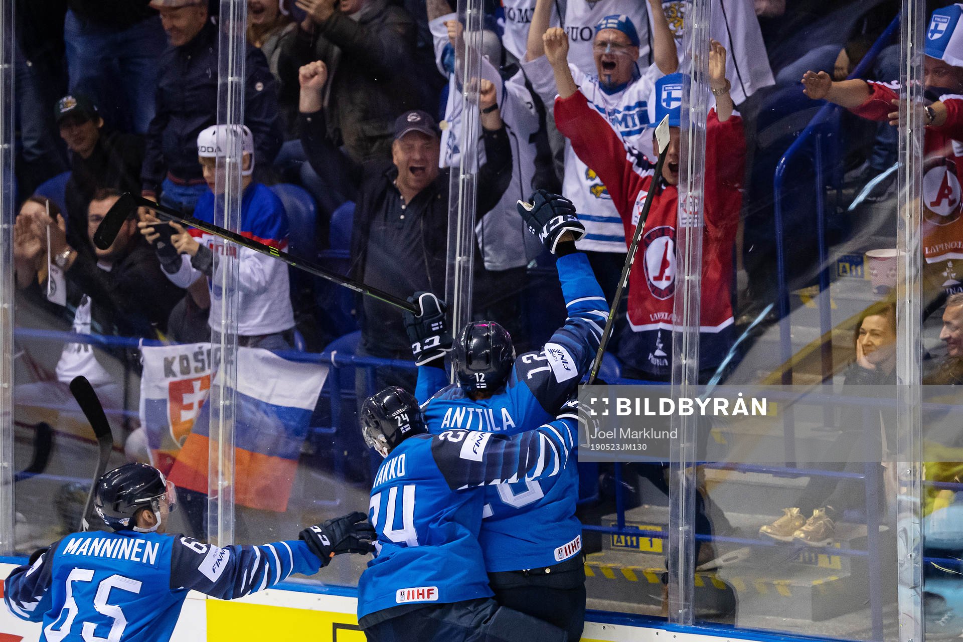 Marko Anttila of Finland celebrates with his teammates