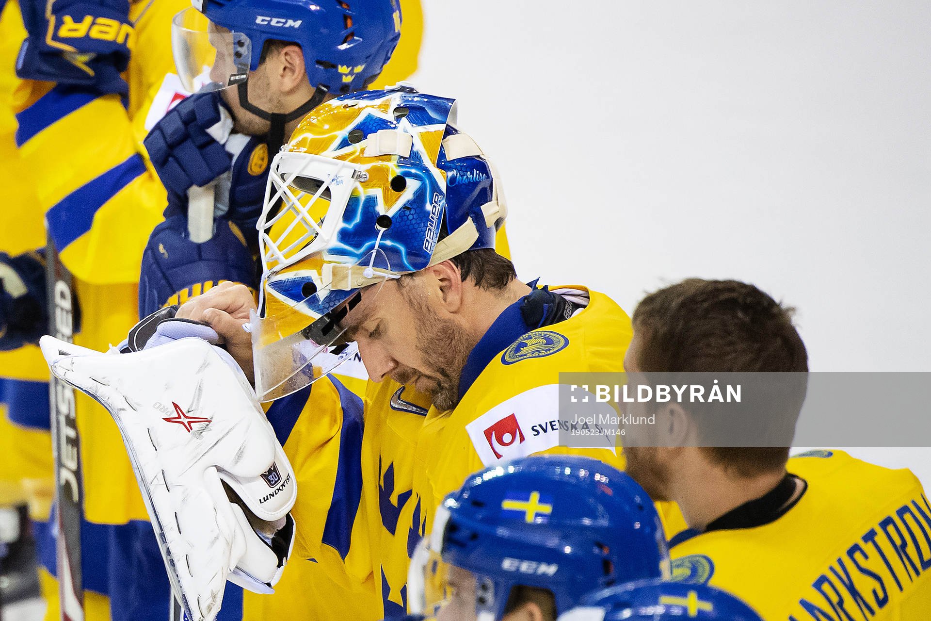 goaltender Henrik Lundqvist of Sweden looks dejected