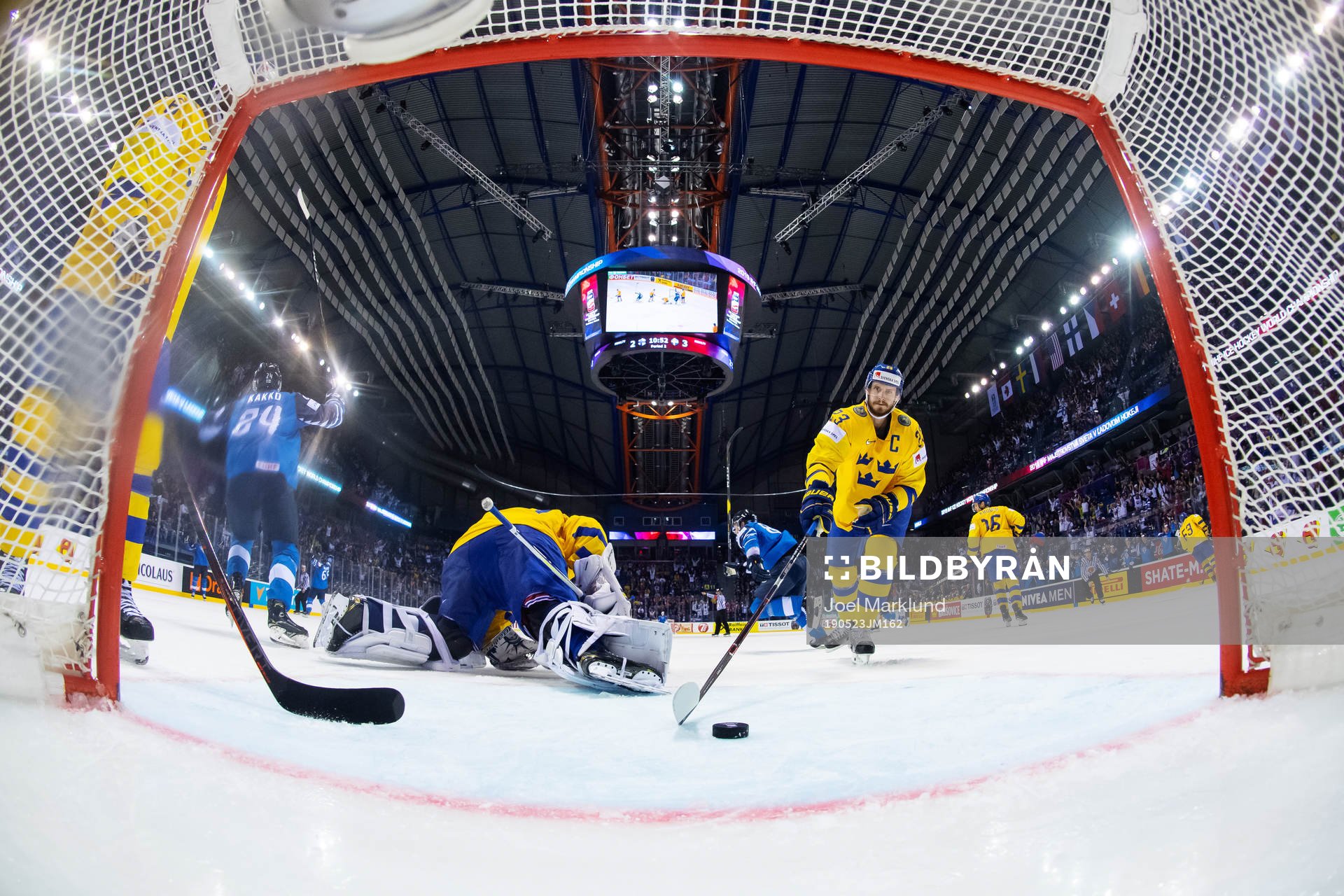 Goaltender Henrik Lundqvist and Oliver Ekman Larsson look
