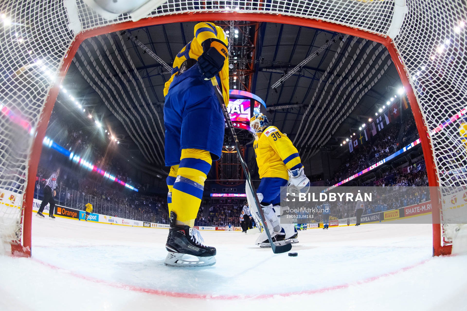 Goaltender Henrik Lundqvist of Sweden looks dejected