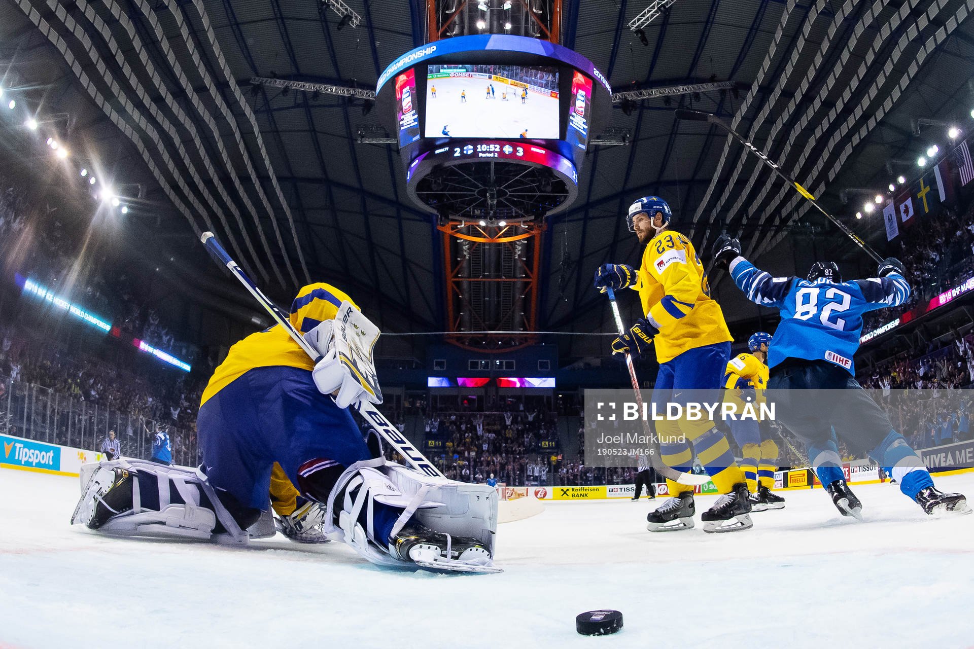 Goaltender Henrik Lundqvist and Oliver Ekman Larsson look