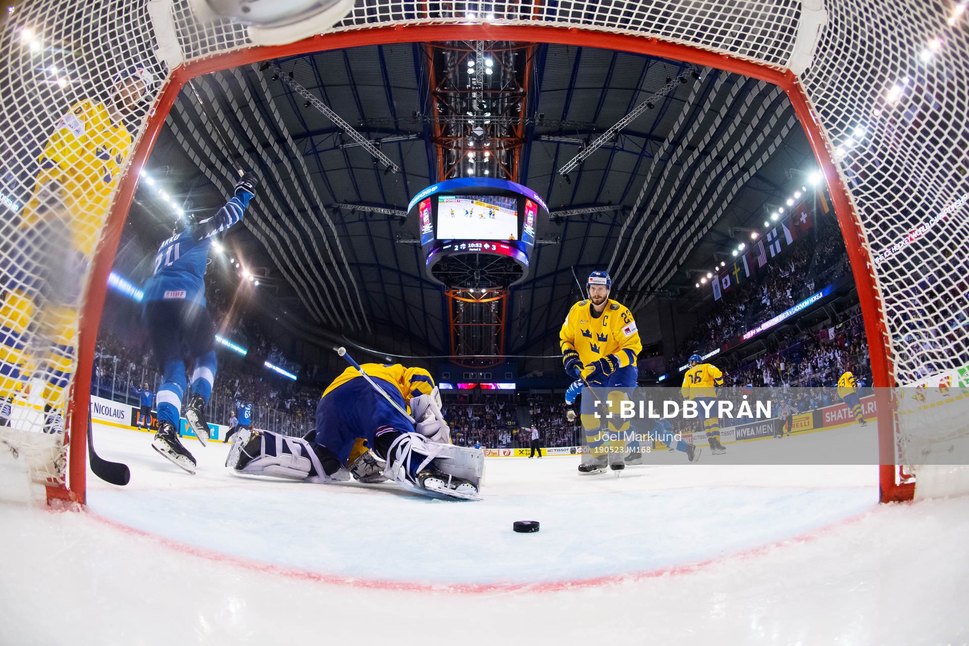 Goaltender Henrik Lundqvist and Oliver Ekman Larsson look