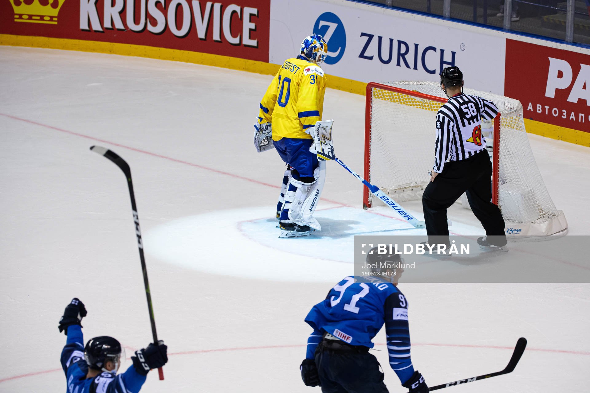 Goaltender Henrik Lundqvist of Sweden looks dejected while