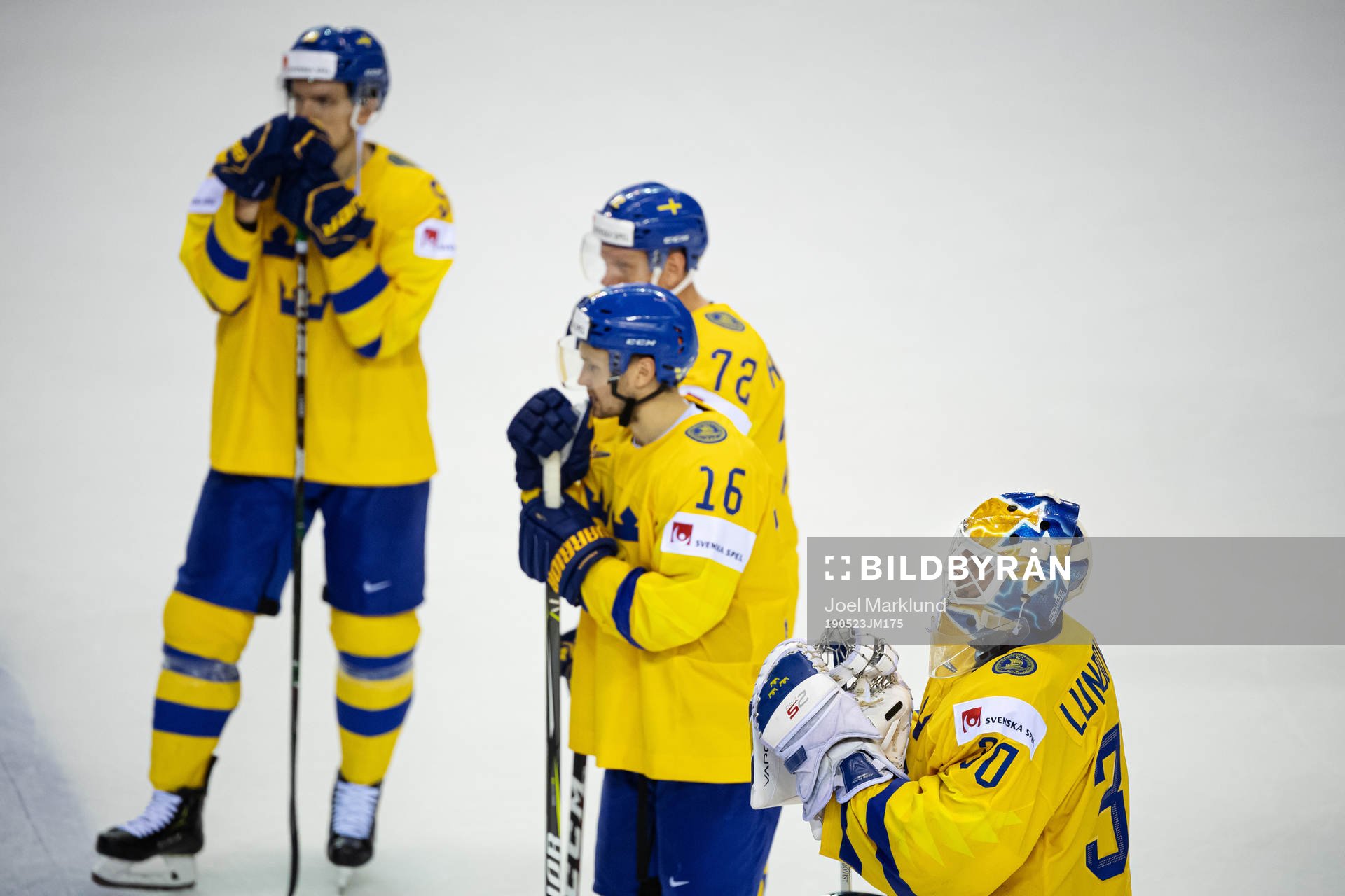 Goaltender Henrik Lundqvist of Sweden looks dejected
