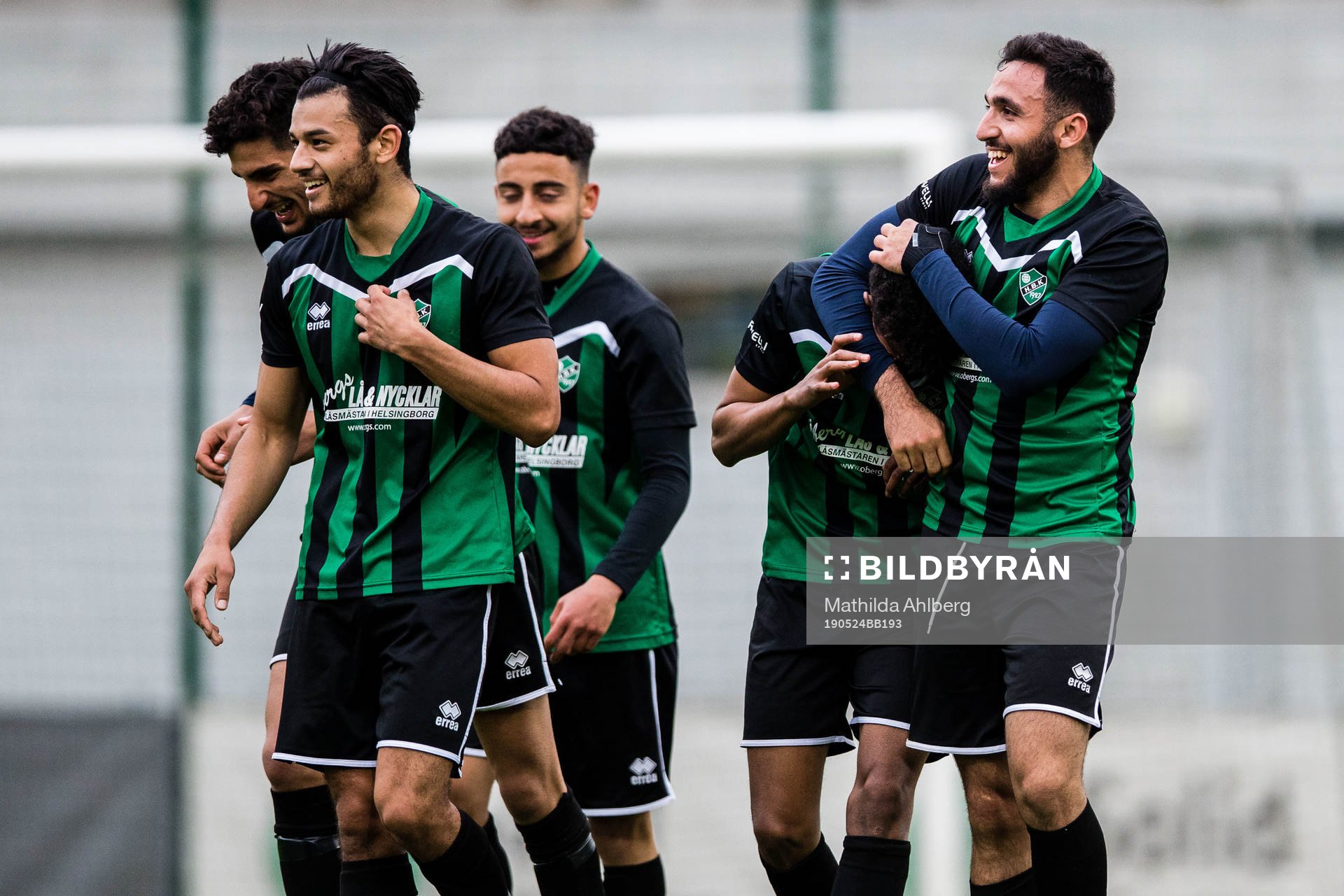 Högaborgs Hassan Maatouk jublar med lagkamrater efter 3-0 under fotbollsmatchen i division 3 Sydvästra Götaland mellan Högaborg och Råå den 24 maj 2019 i Helsingborg .