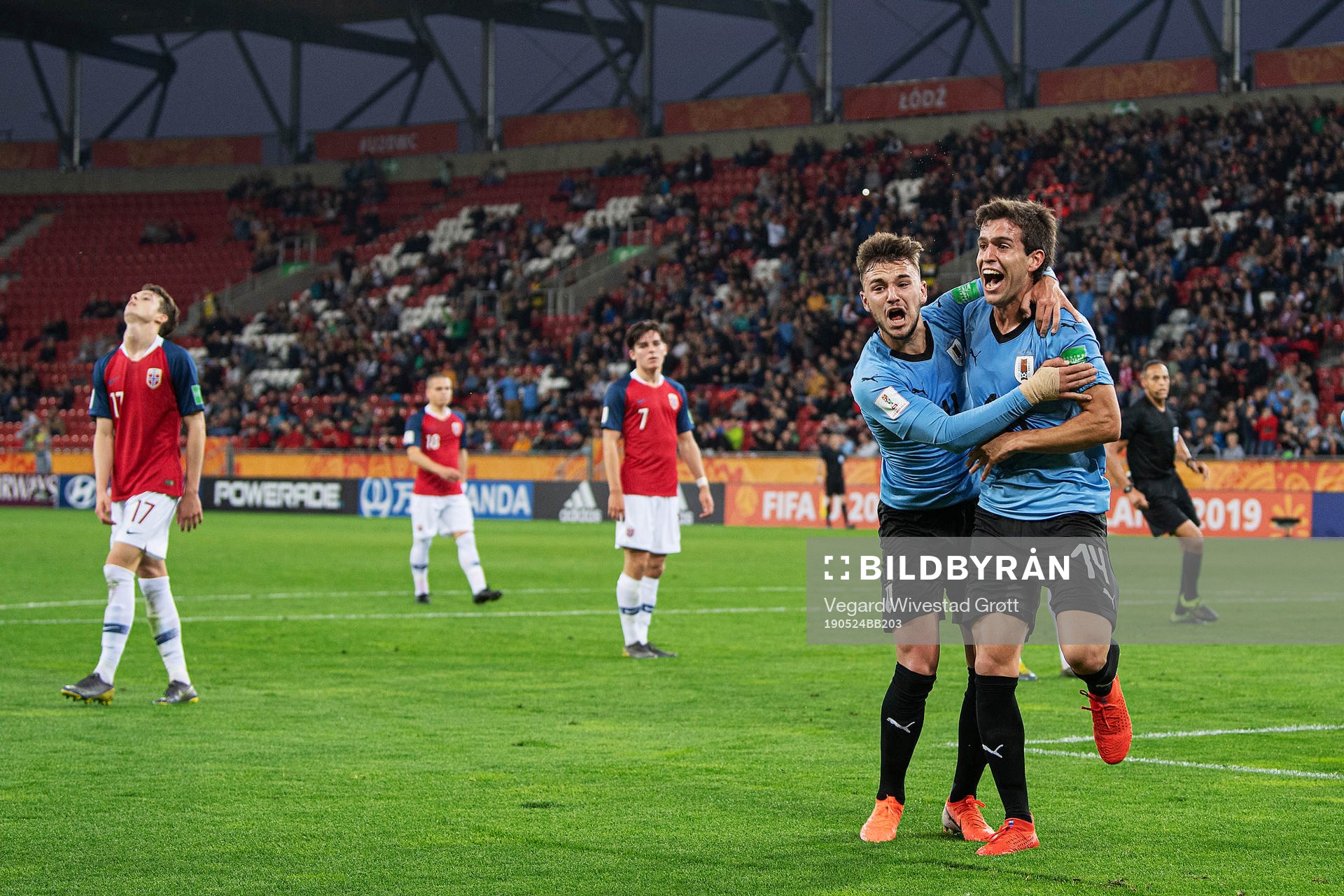 Francisco Ginella and Ezequiel Busquets Sanguinetti of Uruguay celebrates after 2-0 during the FIFA U-20 World Cup football match between Uruguay and Norway on May 24, 2019 in Lodz.
