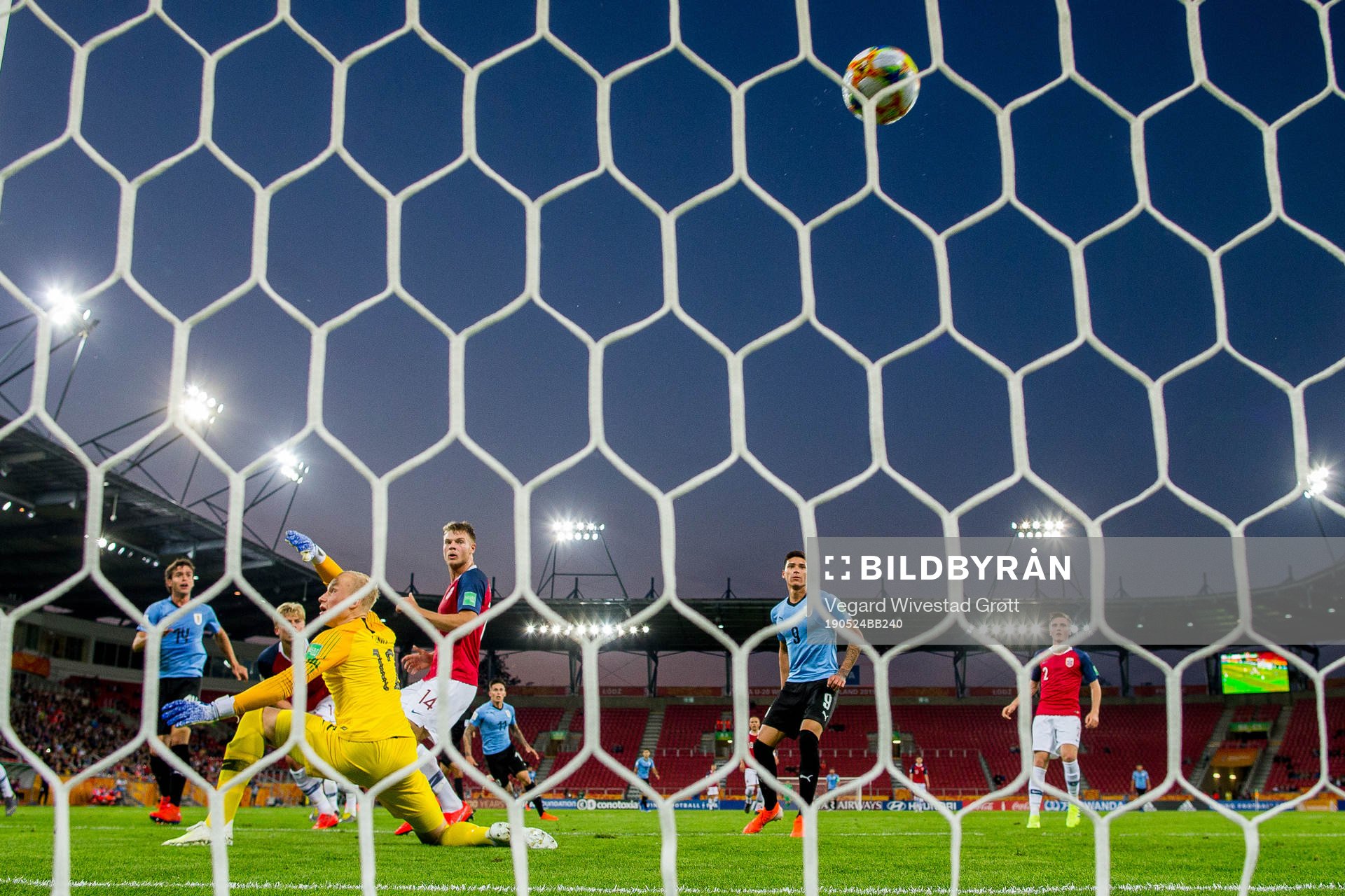 Francisco Ginella of Uruguay scores 2-0 behind goalkeeper Julian Faye Lund of Norway during the FIFA U-20 World Cup football match between Uruguay and Norway on May 24, 2019 in Lodz.