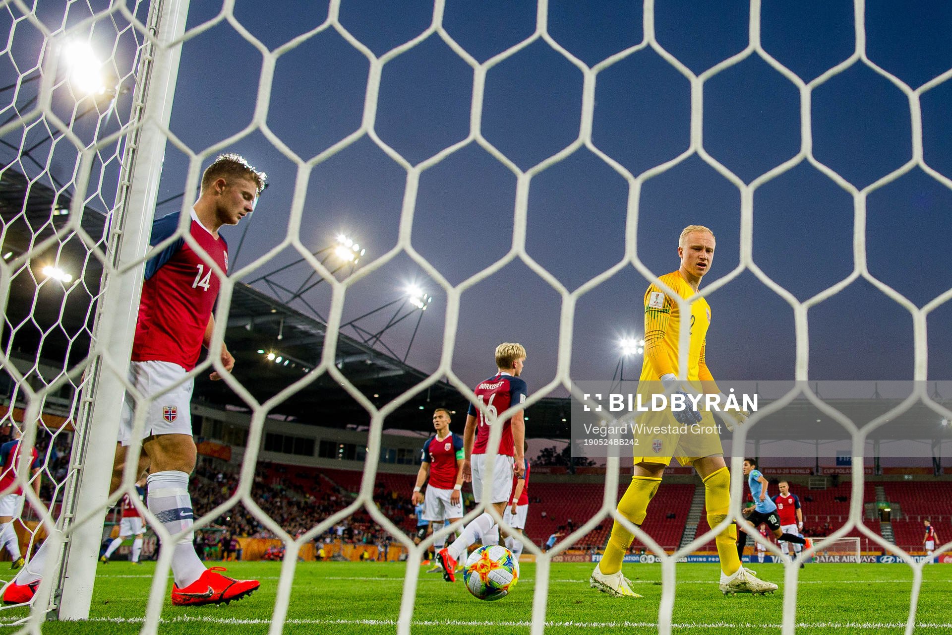 Ulrik Fredriksen and goalkeeper Julian Faye Lund of Norway