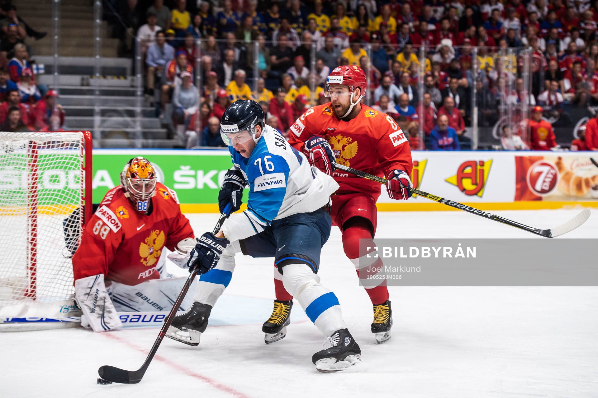 Jere Sallinen of Finland against goaltender Andrei