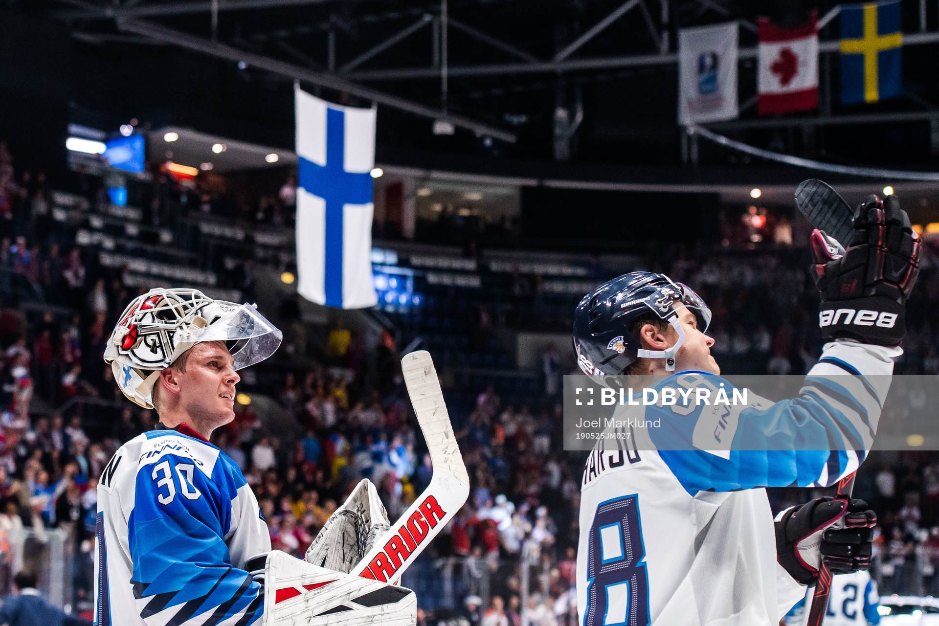 Goaltender Kevin Lankinen and Henri Jokiharju of Finland
