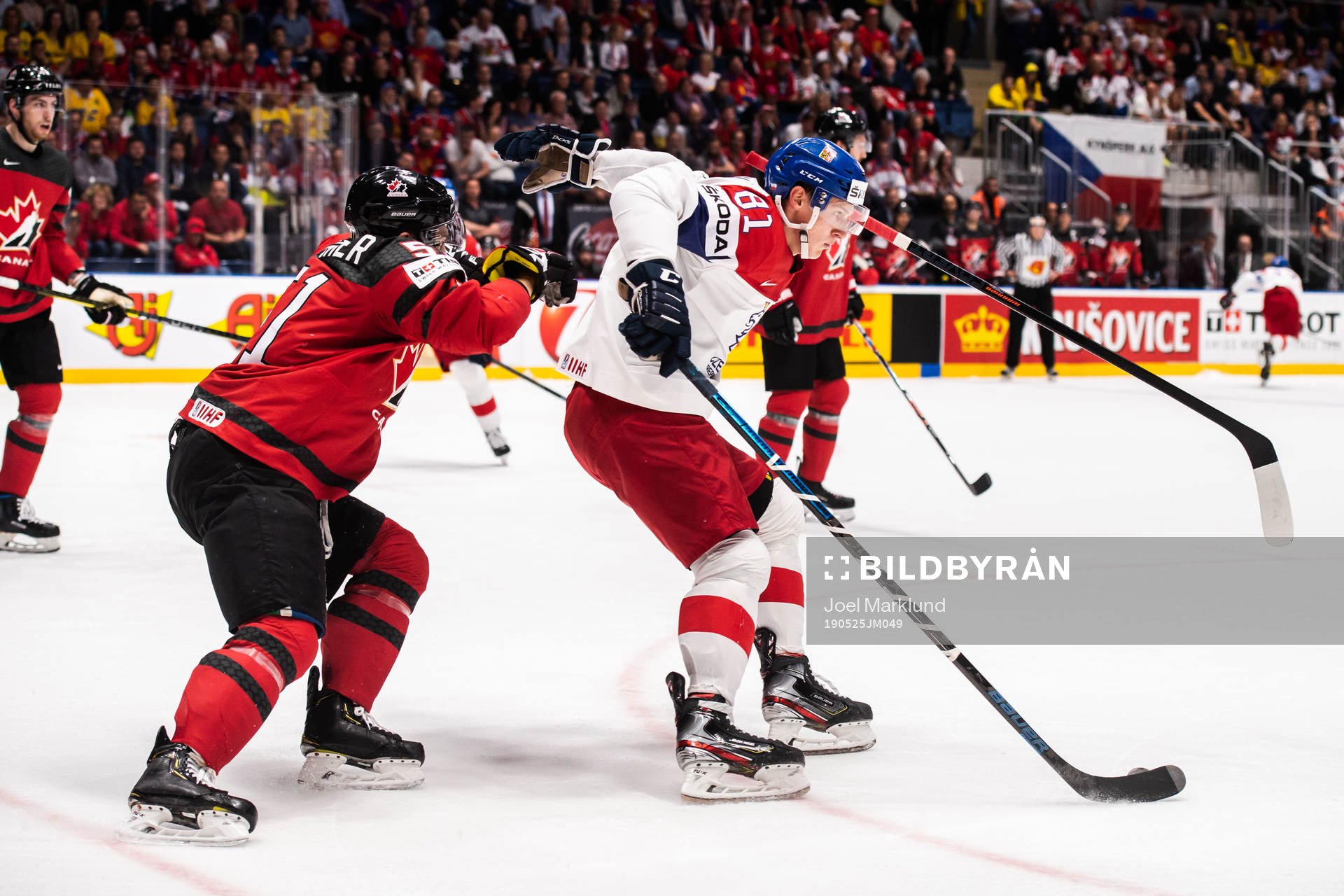 Troy Stecher of Canada and Dominik Kubalik of Czech Republic