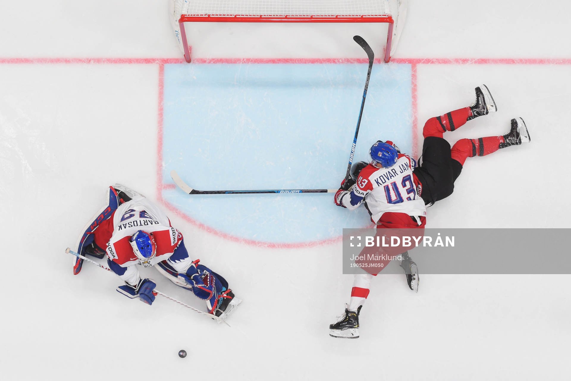 Goaltender Patrik Bartosak and Jan Kovar of Czech Republic