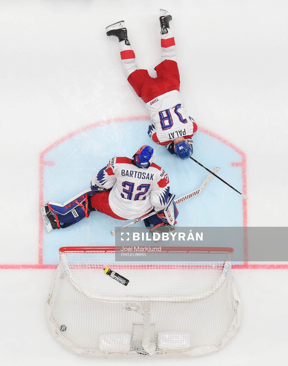 Goaltender Patrik Bartosak and Ondrej Palat of Czech