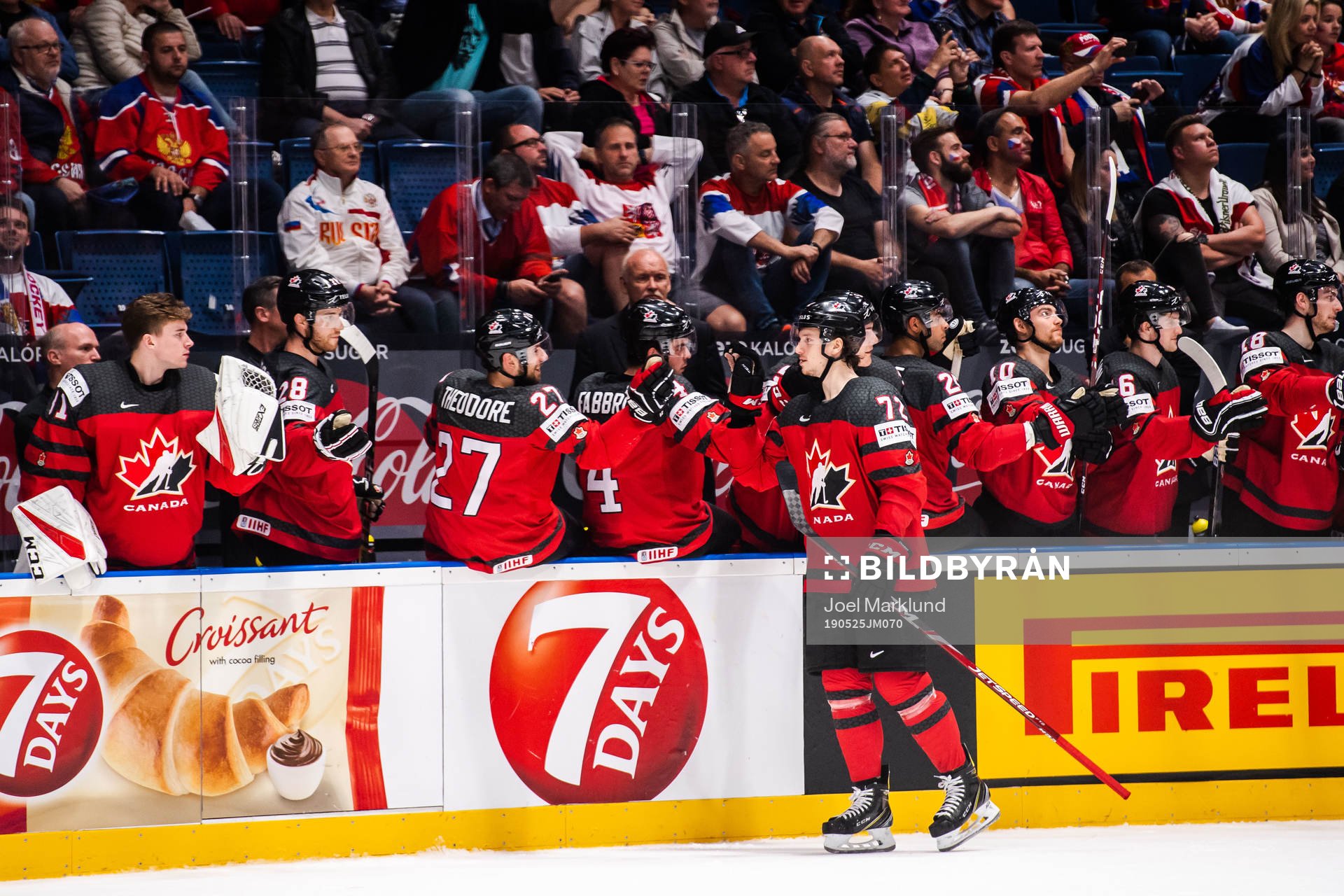 Thomas Chabot of Canada celebrate with teammates