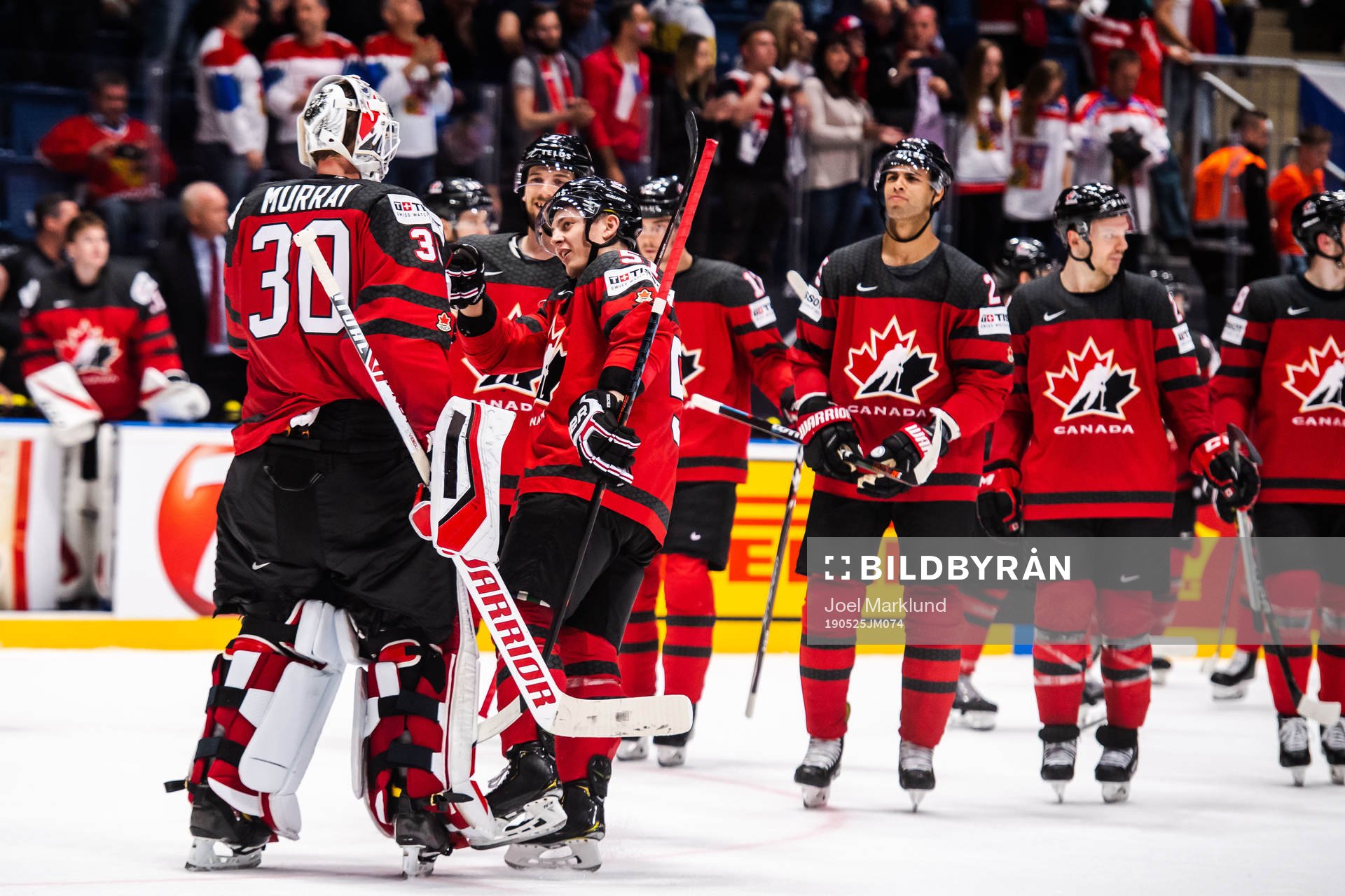 Mathieu Joseph of Canada celebrate with teammates