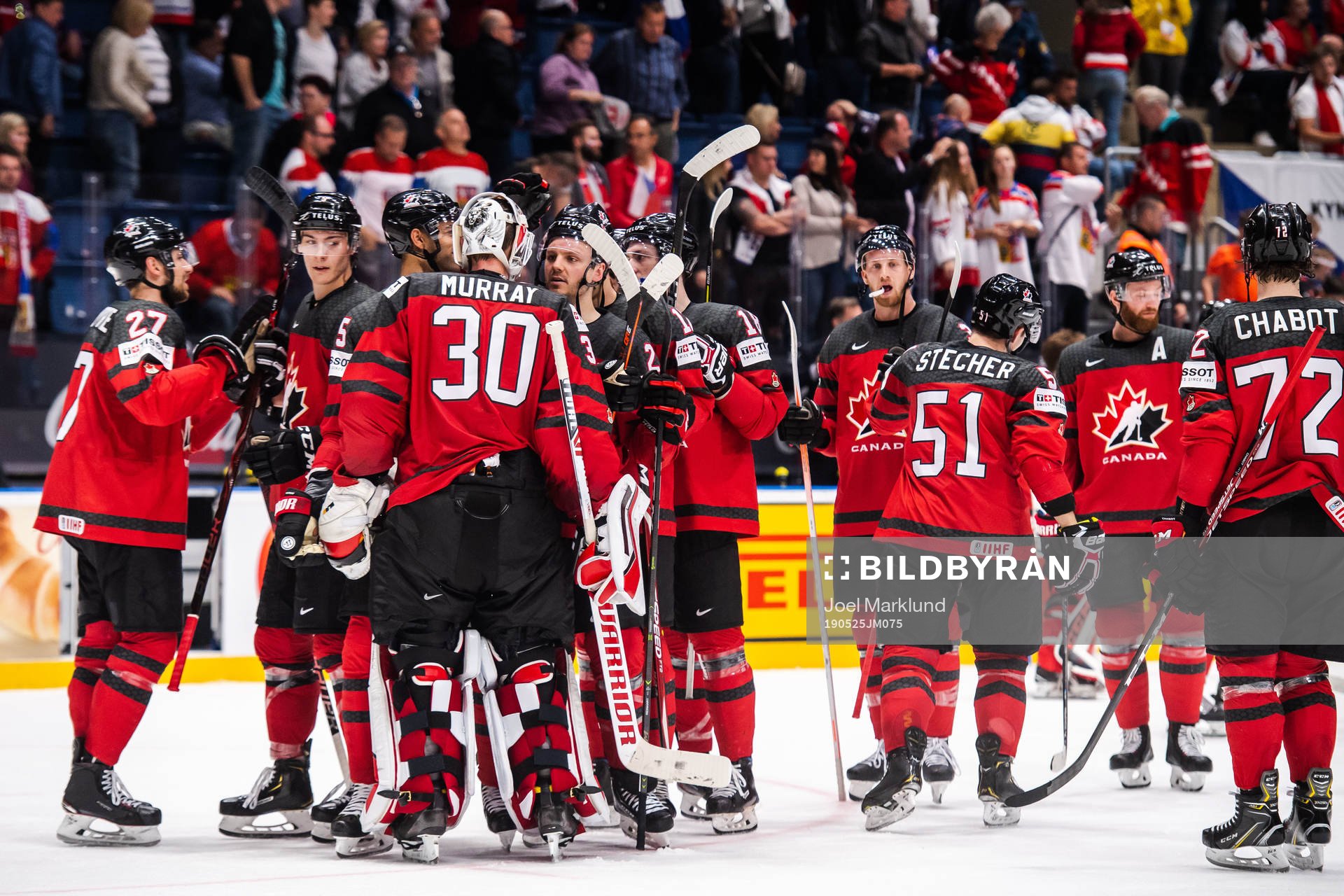 Goaltender Matt Murray of Canada celebrate with teammates