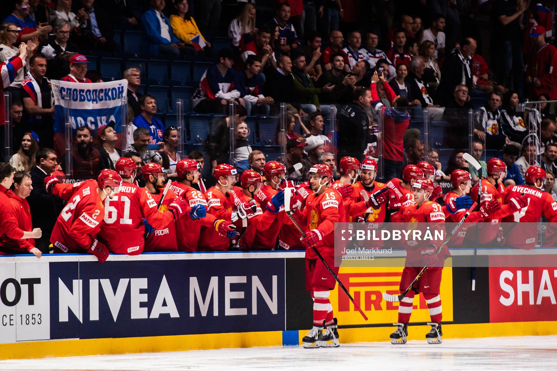 Artyom Anisimov and Nikita Gusev of Russia celebrate with