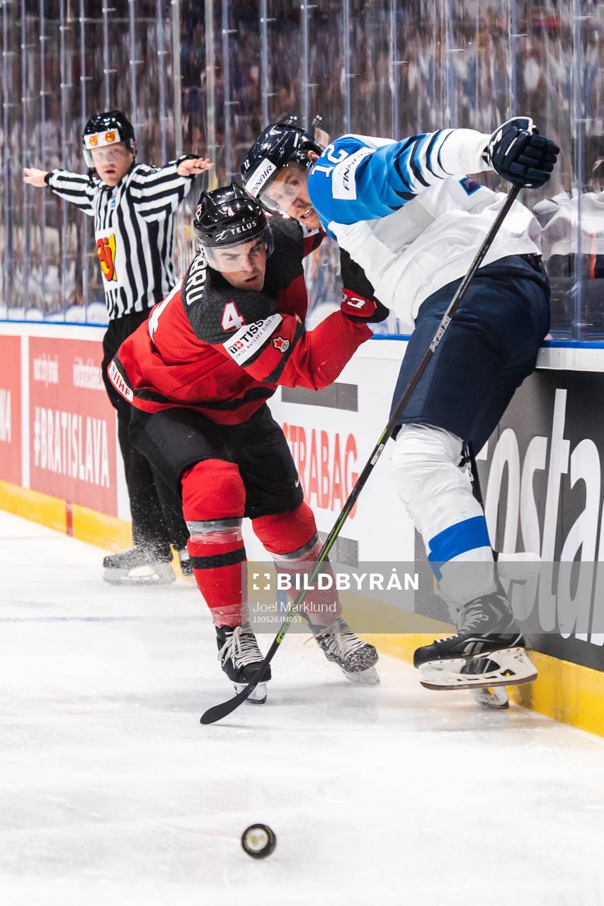 Dante Fabbro of Canada and Marko Anttila of Finland