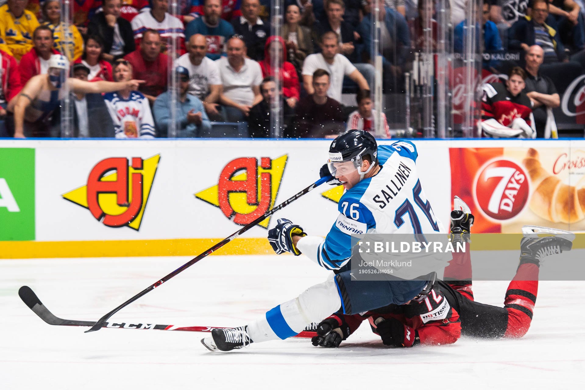Jere Sallinen of Finland and Thomas Chabot of Canada