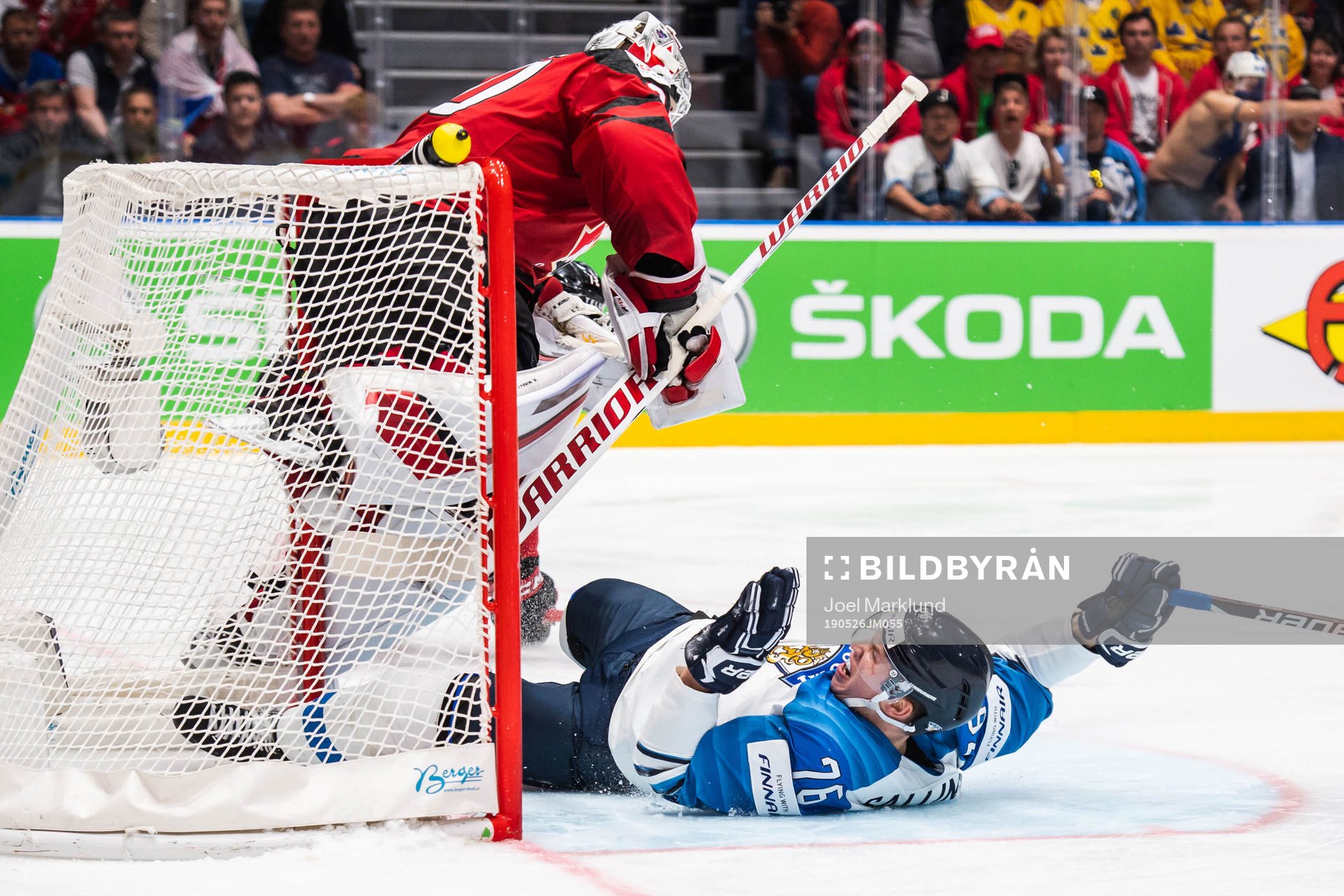 Goaltender Matt Murray of Canada and Jere Sallinen of