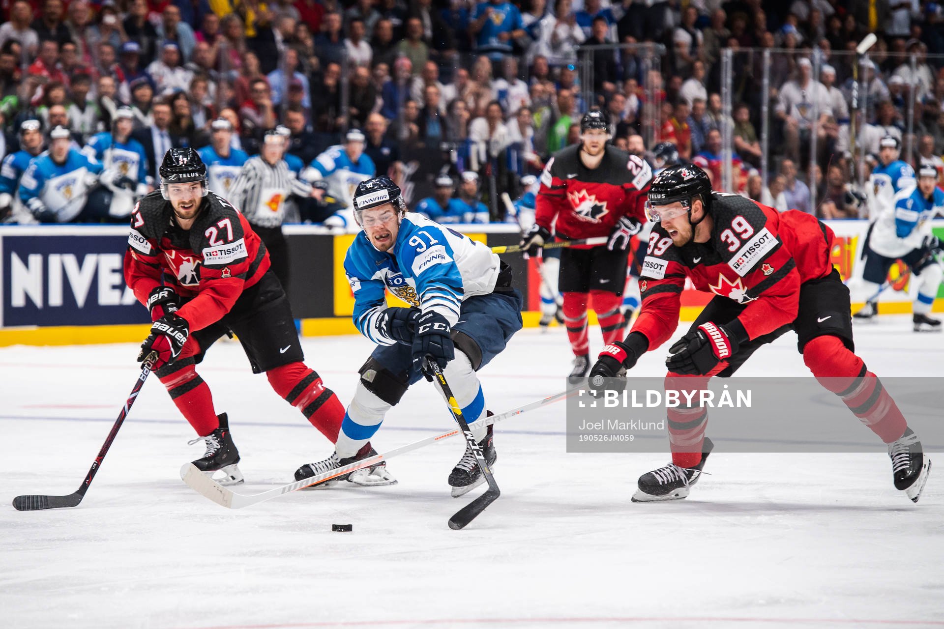 Shea Theodore and Anthony Mantha of Canada against Juho
