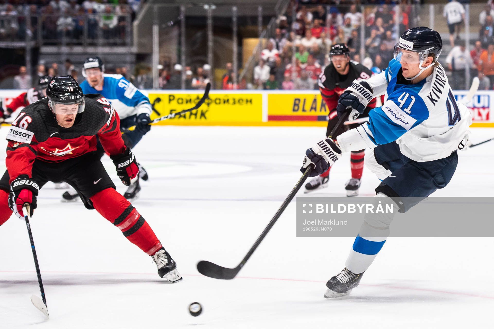 Jared McCann of Canada and Joel Kiviranta of Finland
