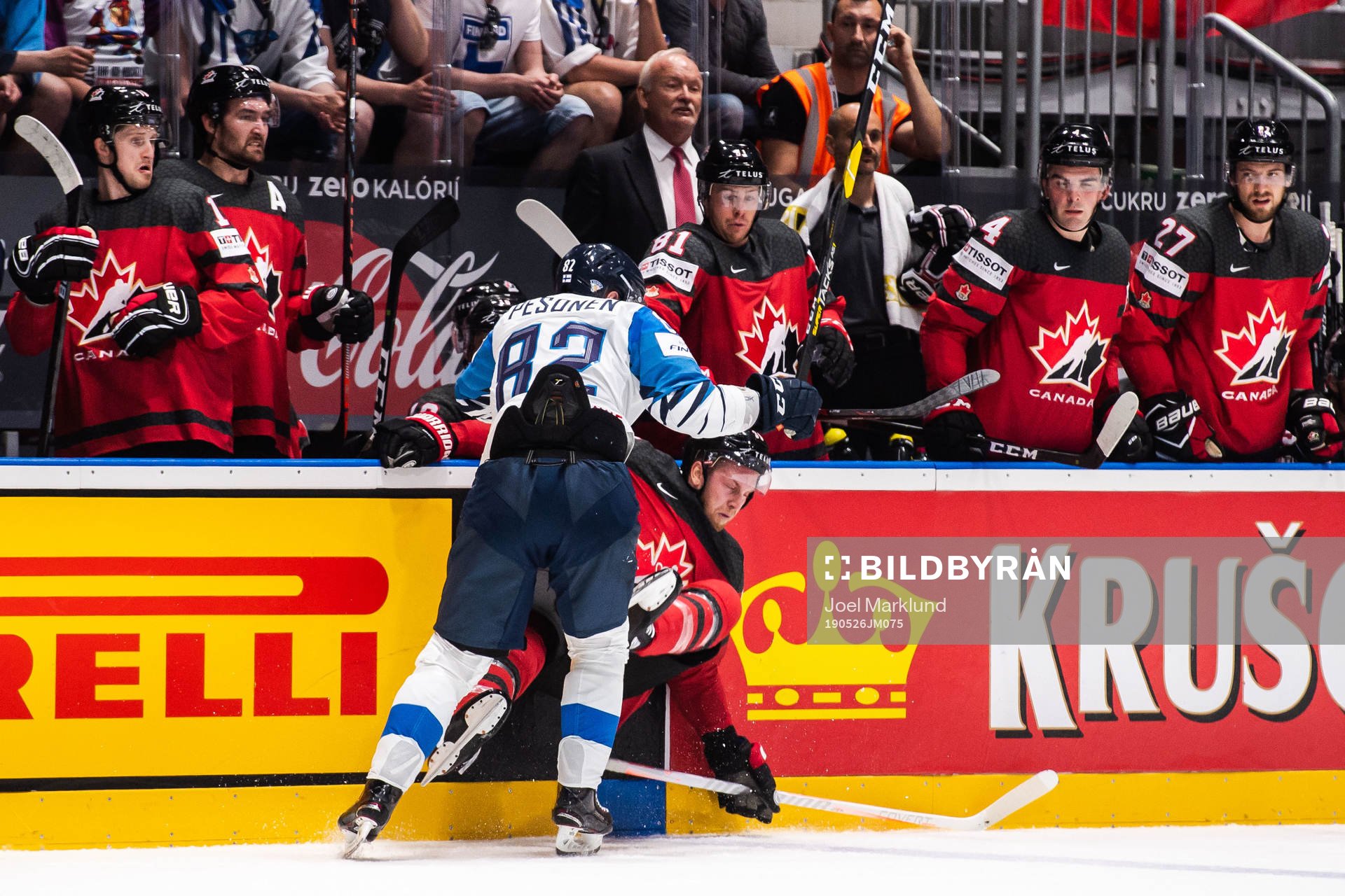 Harri Pesonen of Finland and Anthony Mantha of Canada