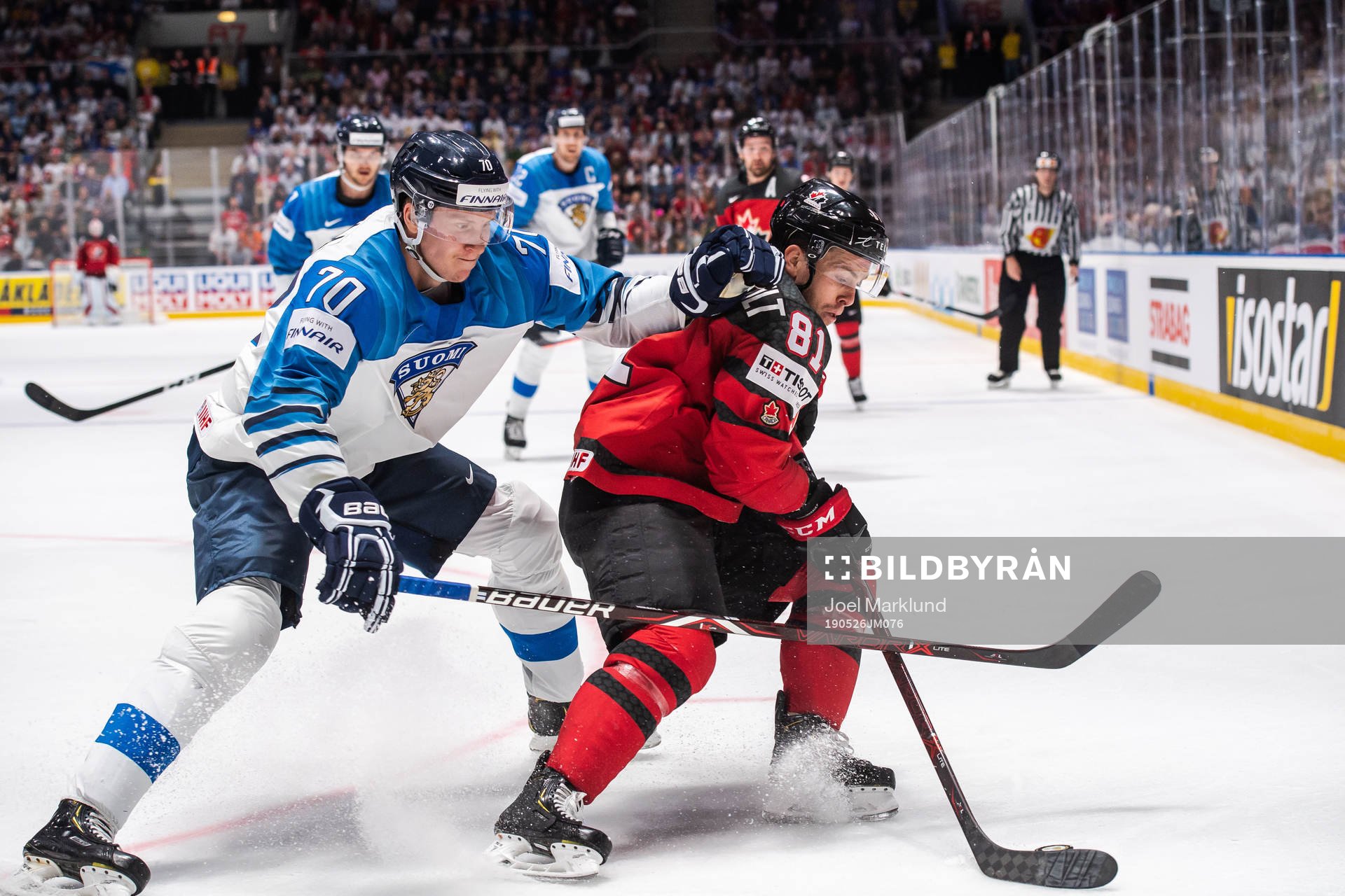 Niko Mikkola of Finland and Jonathan Marchessault of Canada