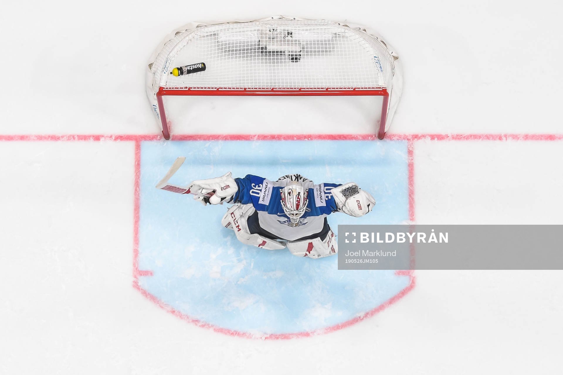Goaltender Kevin Lankinen of Finland celebrate their win