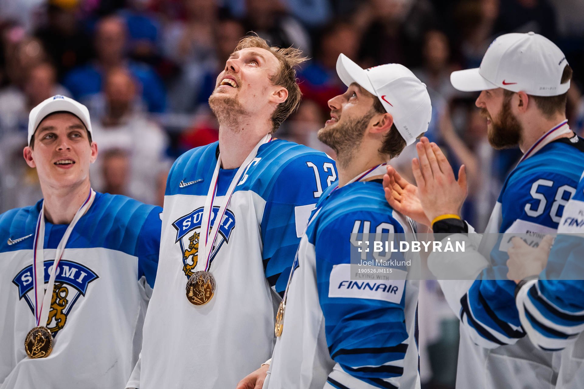 Marko Anttila of Finland celebrate with his gold medal