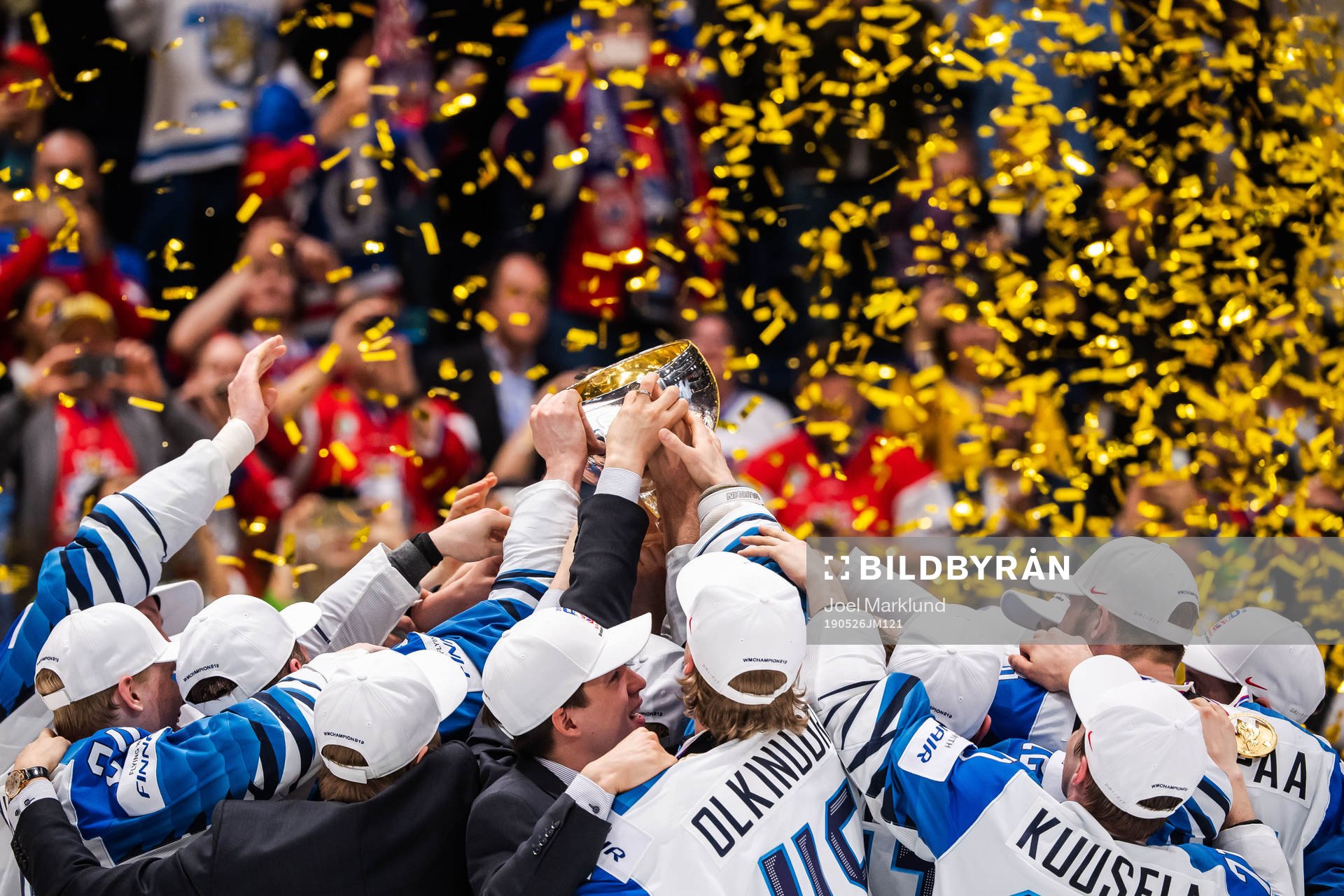 Players of Finland celebrates with the trophy