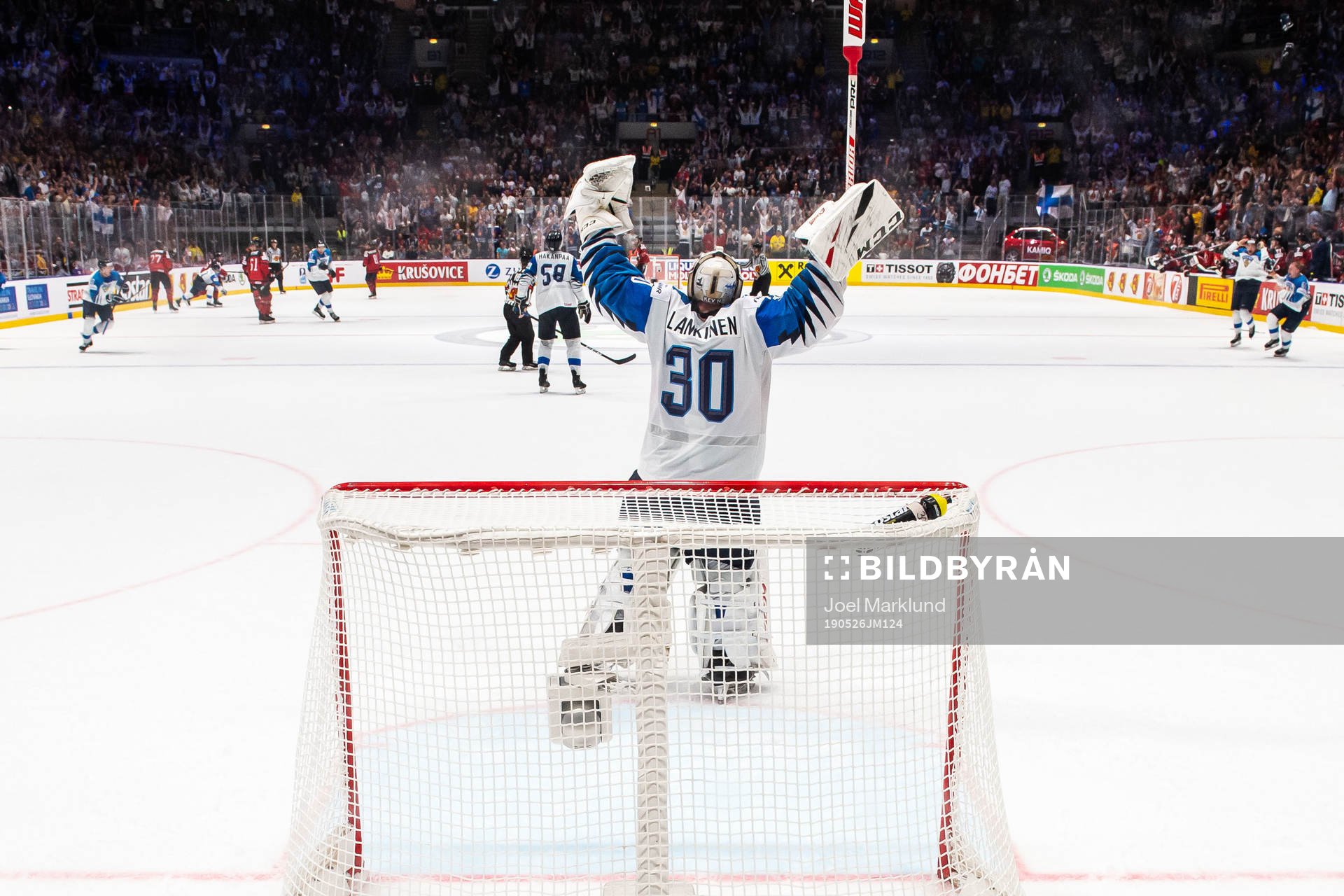Goaltender Kevin Lankinen of Finland celebrate their win