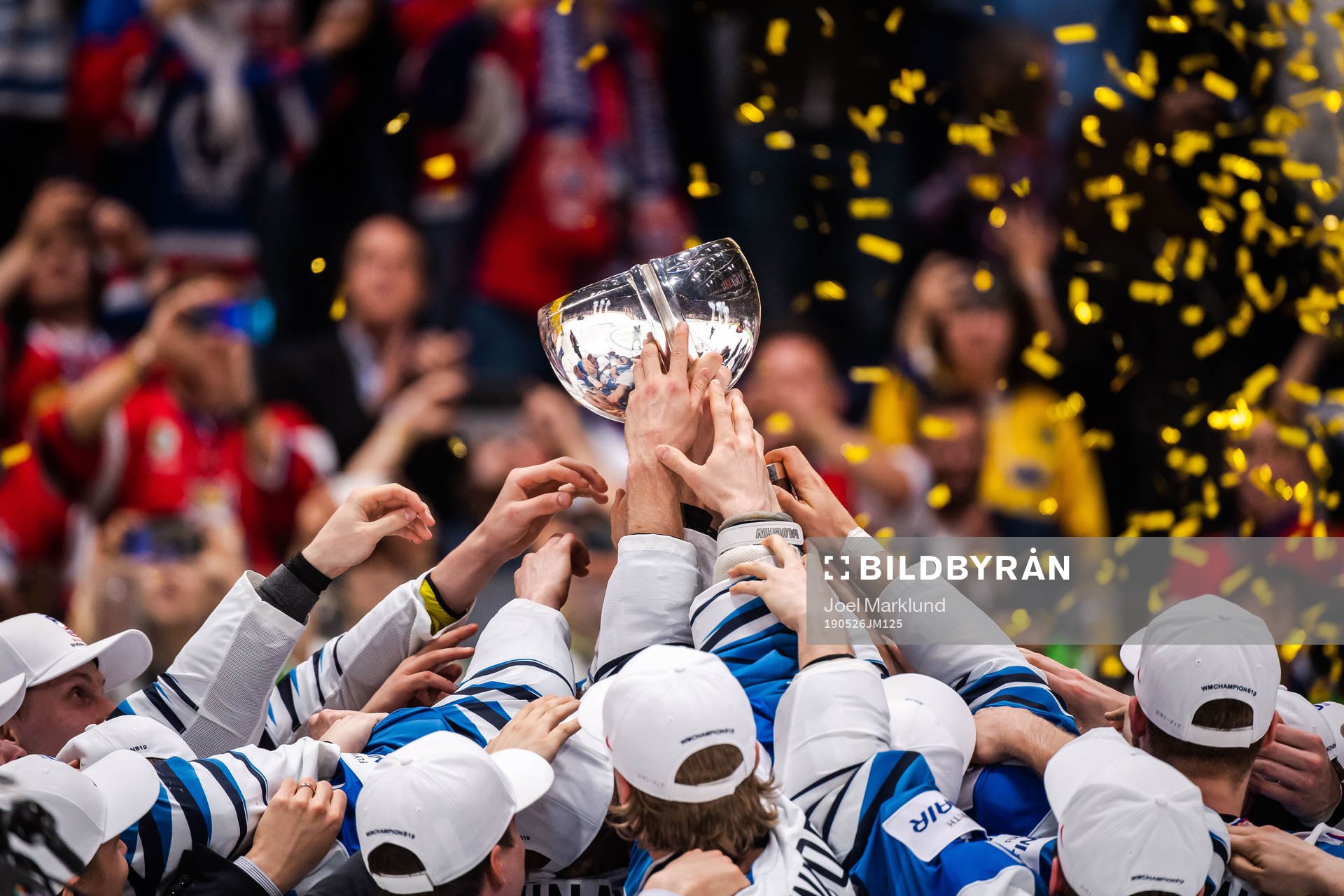 Players of Finland celebrates with the trophy